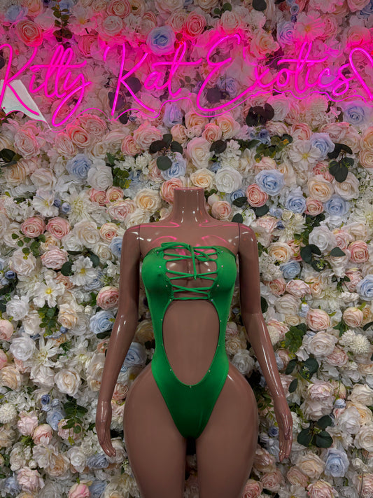Green bodysuit with lace-up crisscross front, high-cut legs