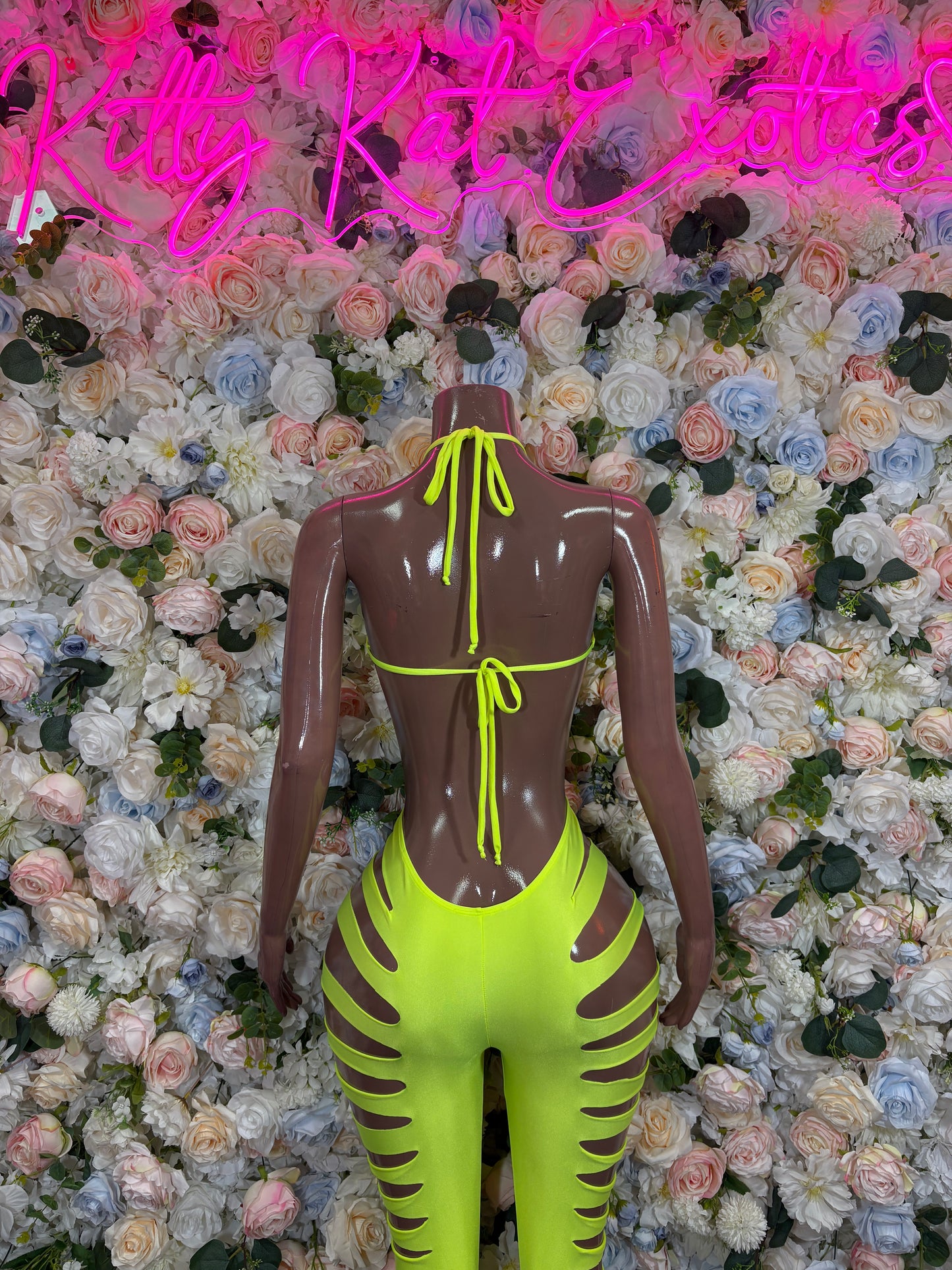 Neon yellow cut-out bodysuit with open back and lace-up ties, sleeveless