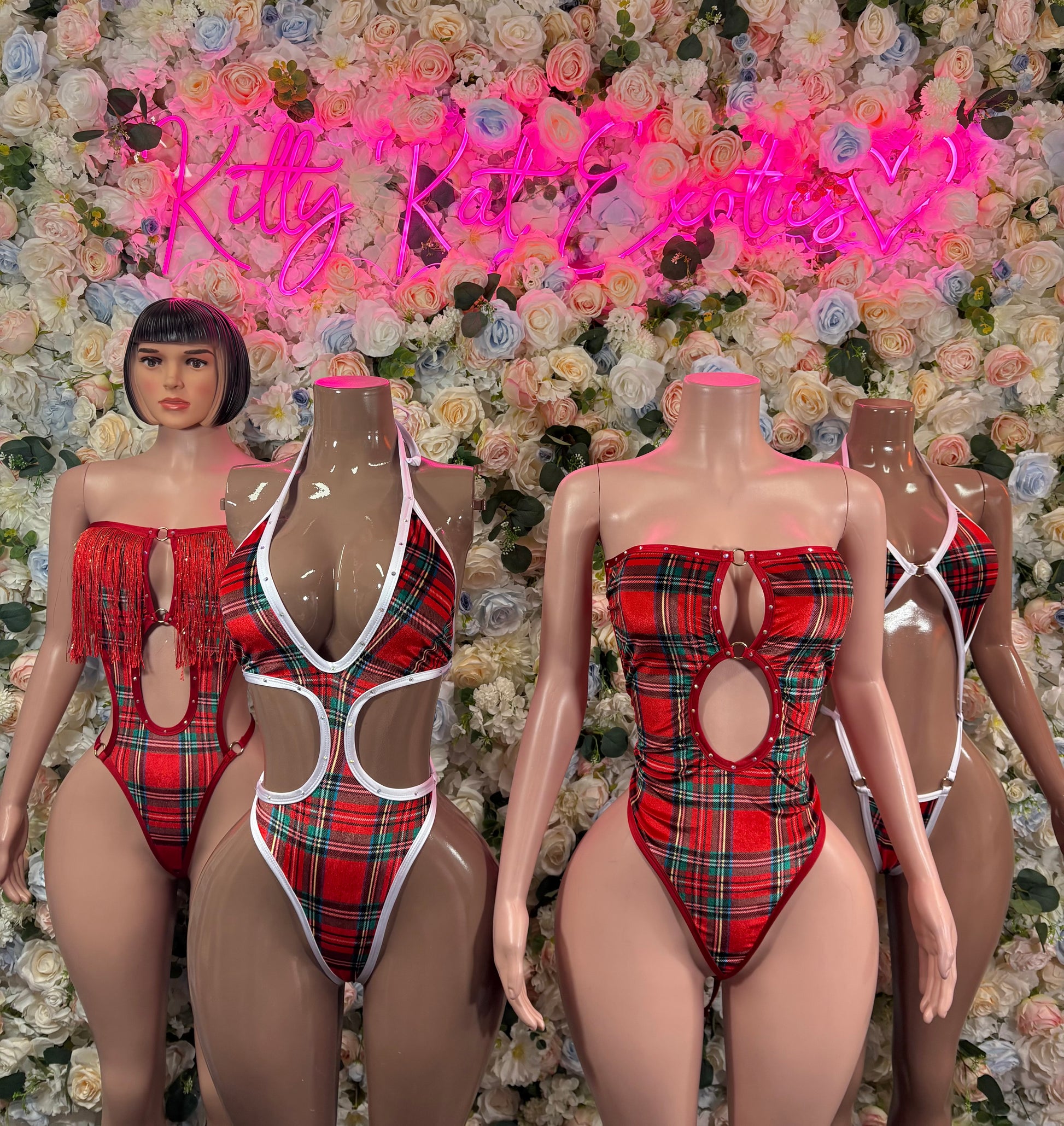 Red plaid one-piece bodysuit with chest cutout, high-cut legs, and tie-back