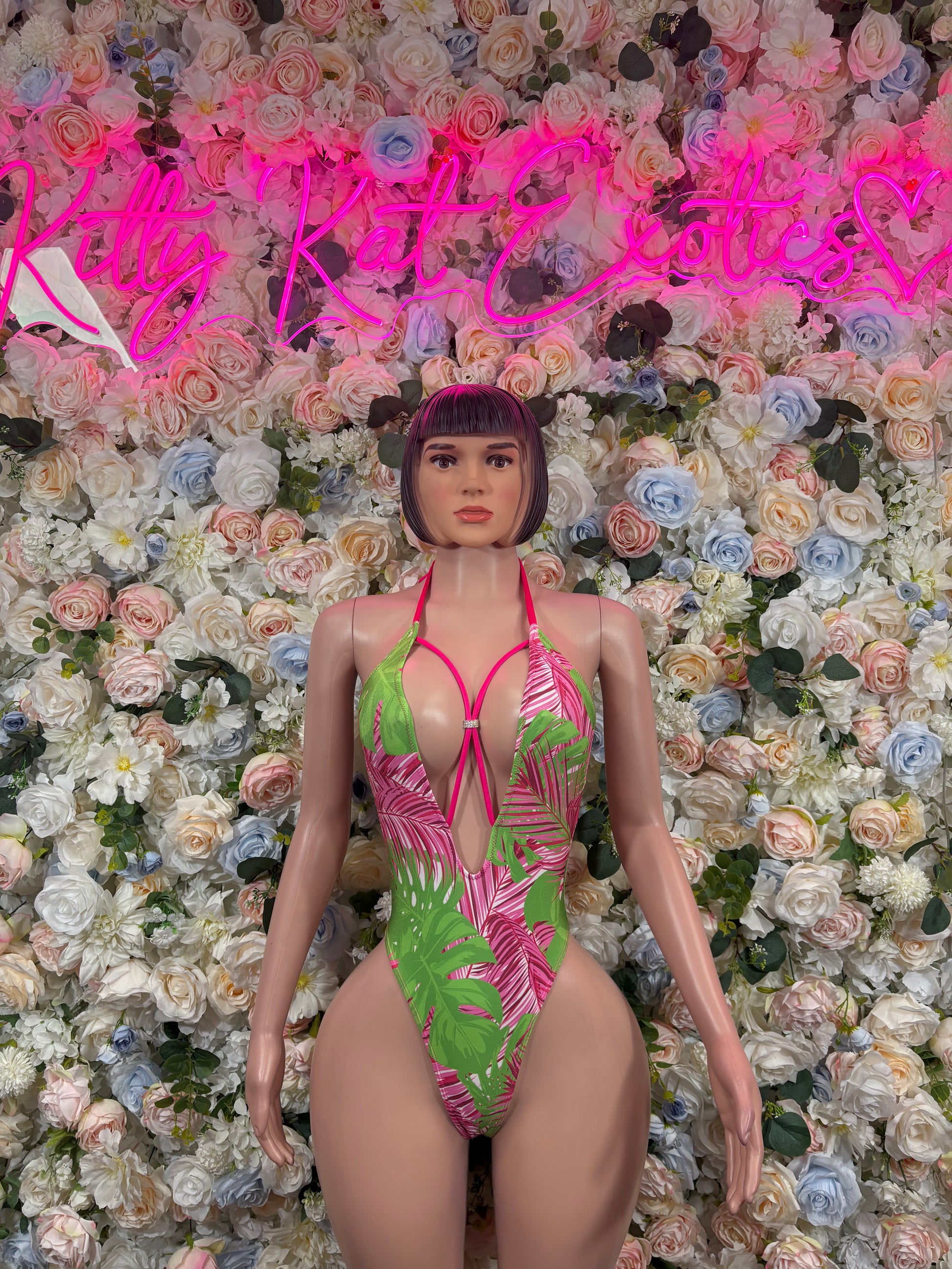 Pink and green tropical leaf bodysuit with strappy halter front and thong cut
