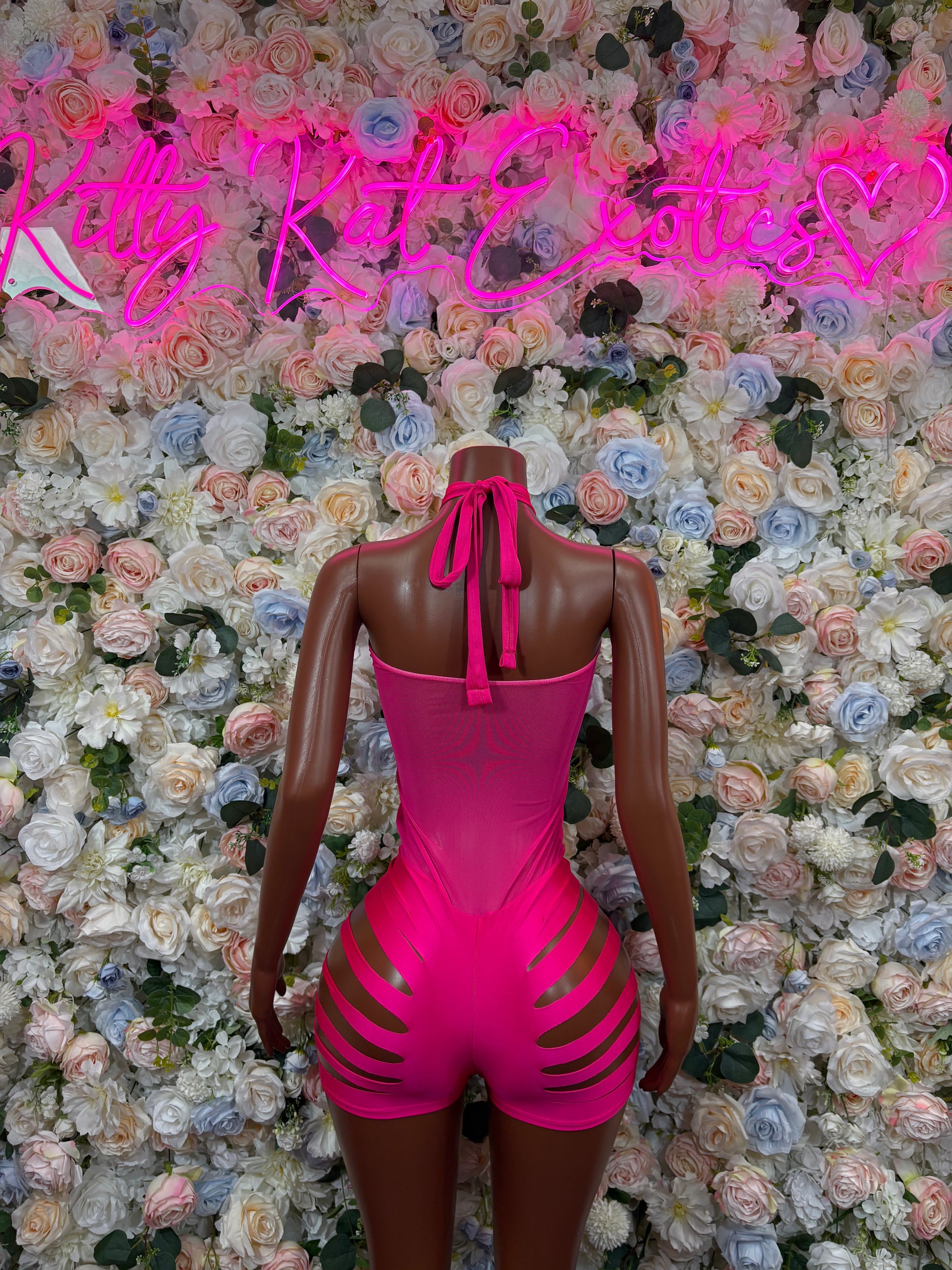 Pink backless bodysuit with tie straps and striped side hip panels