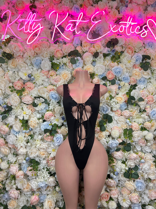 Black sleeveless bodysuit with lace-up center front and deep V neckline