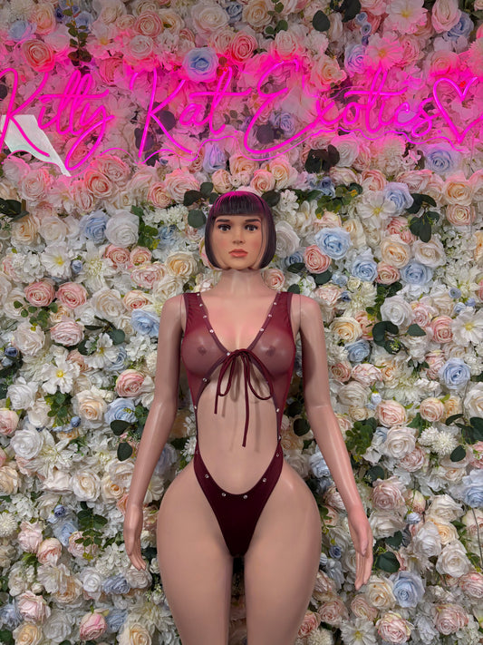 Burgundy strappy bodysuit with lace-up neckline and thong-style backless cutout