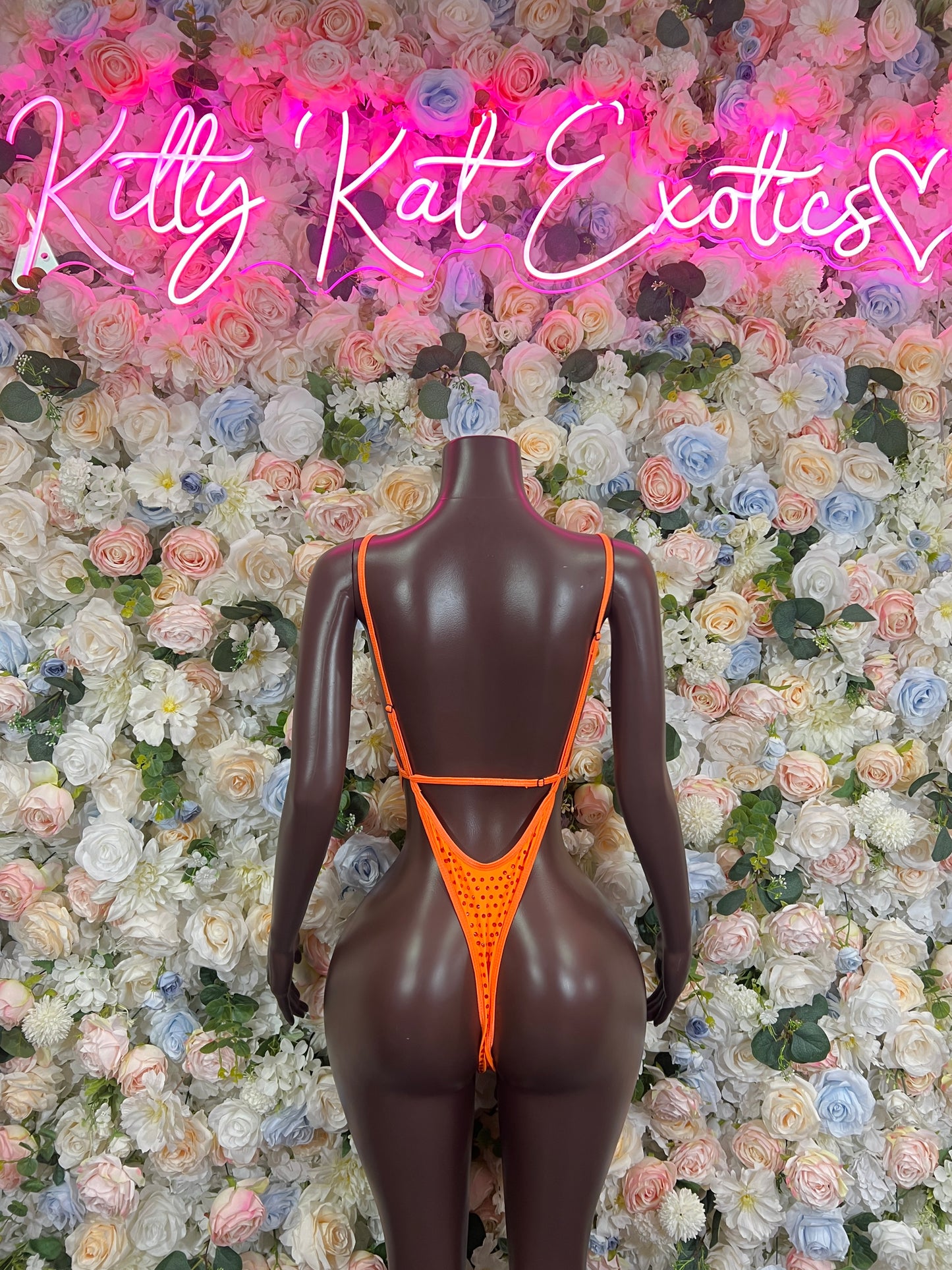 Orange rhinestone bodysuit with V-back and narrow straps one-piece
