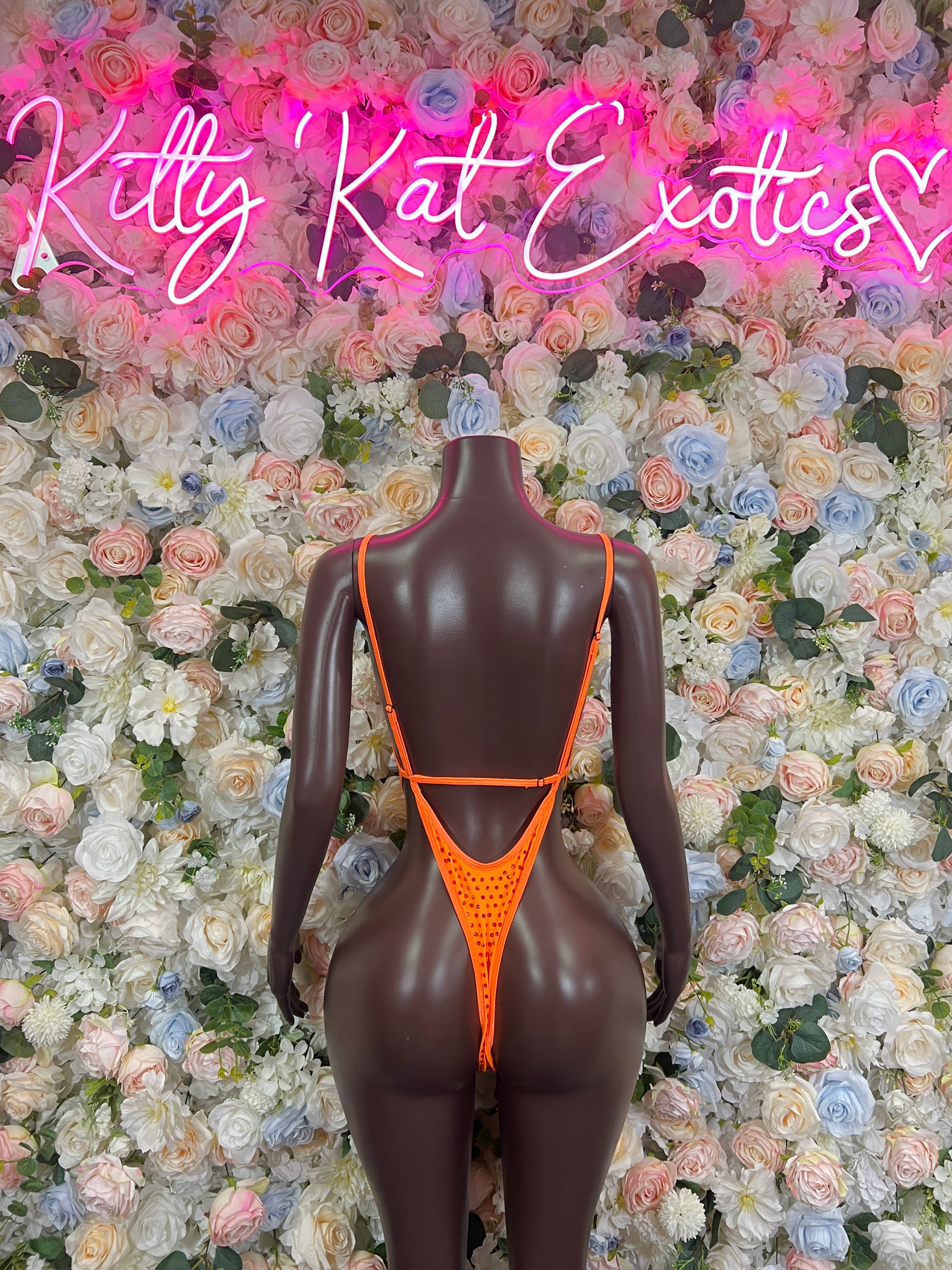 Orange rhinestone bodysuit with V-back and narrow straps one-piece