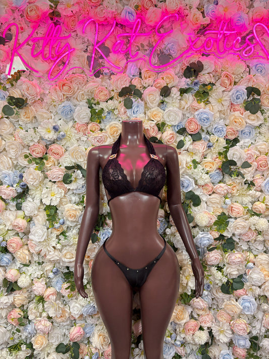 Black strappy bikini lingerie with halter triangle bra and high-cut bikini bottoms