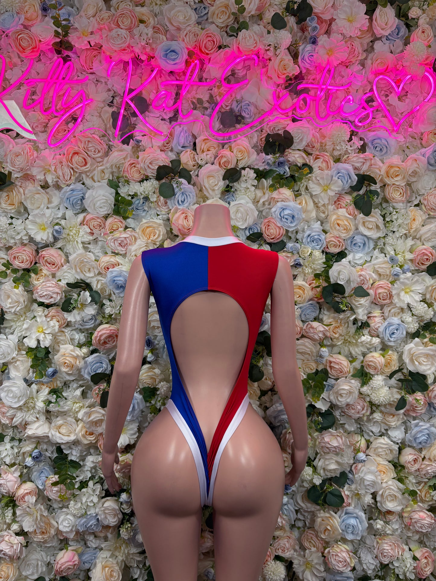 Dominican flag style bodysuit, back view with open center cutout in red, blue, white