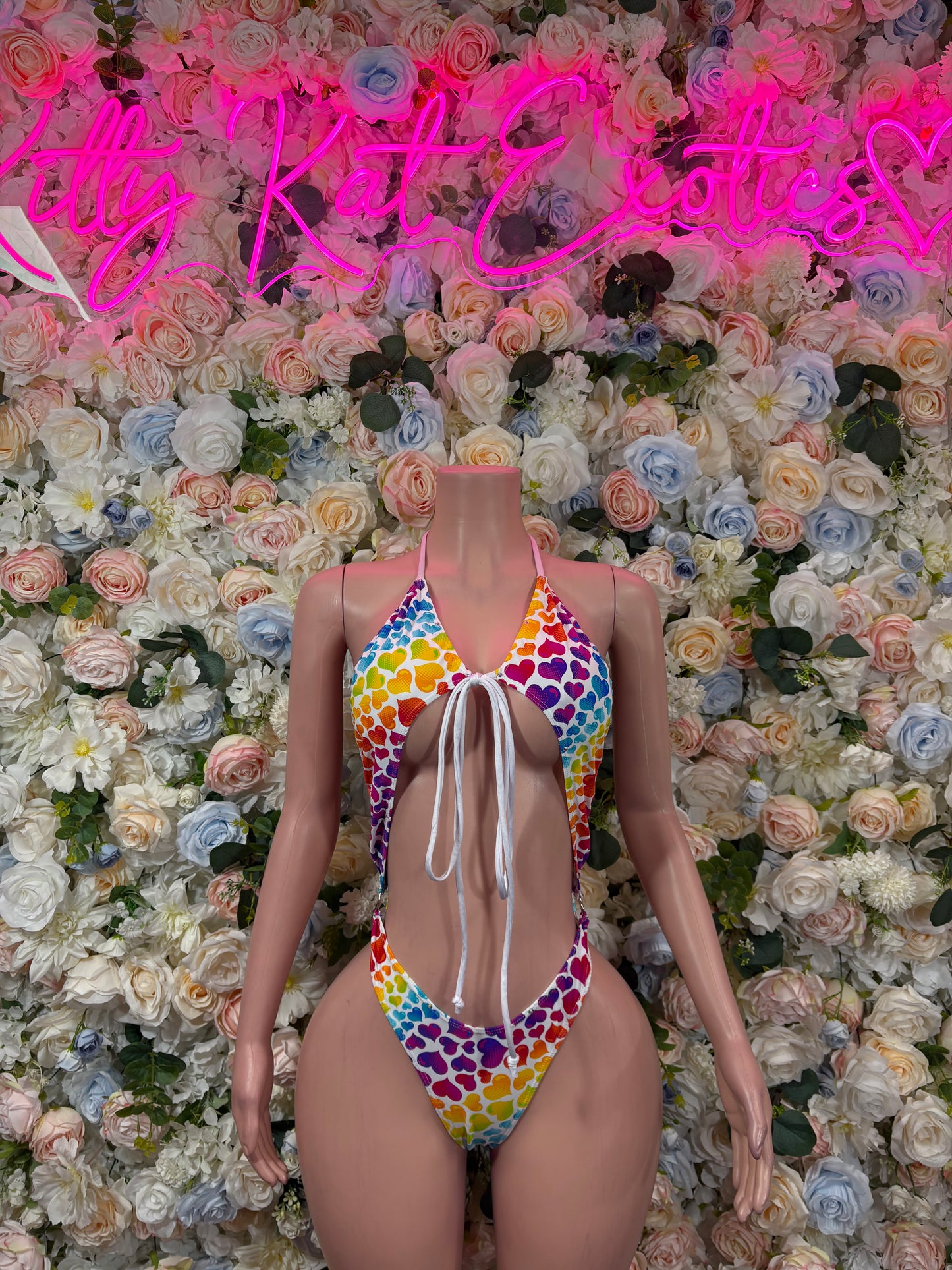 Heart-pattern one-piece swimsuit, open back with tie straps and colorful cups