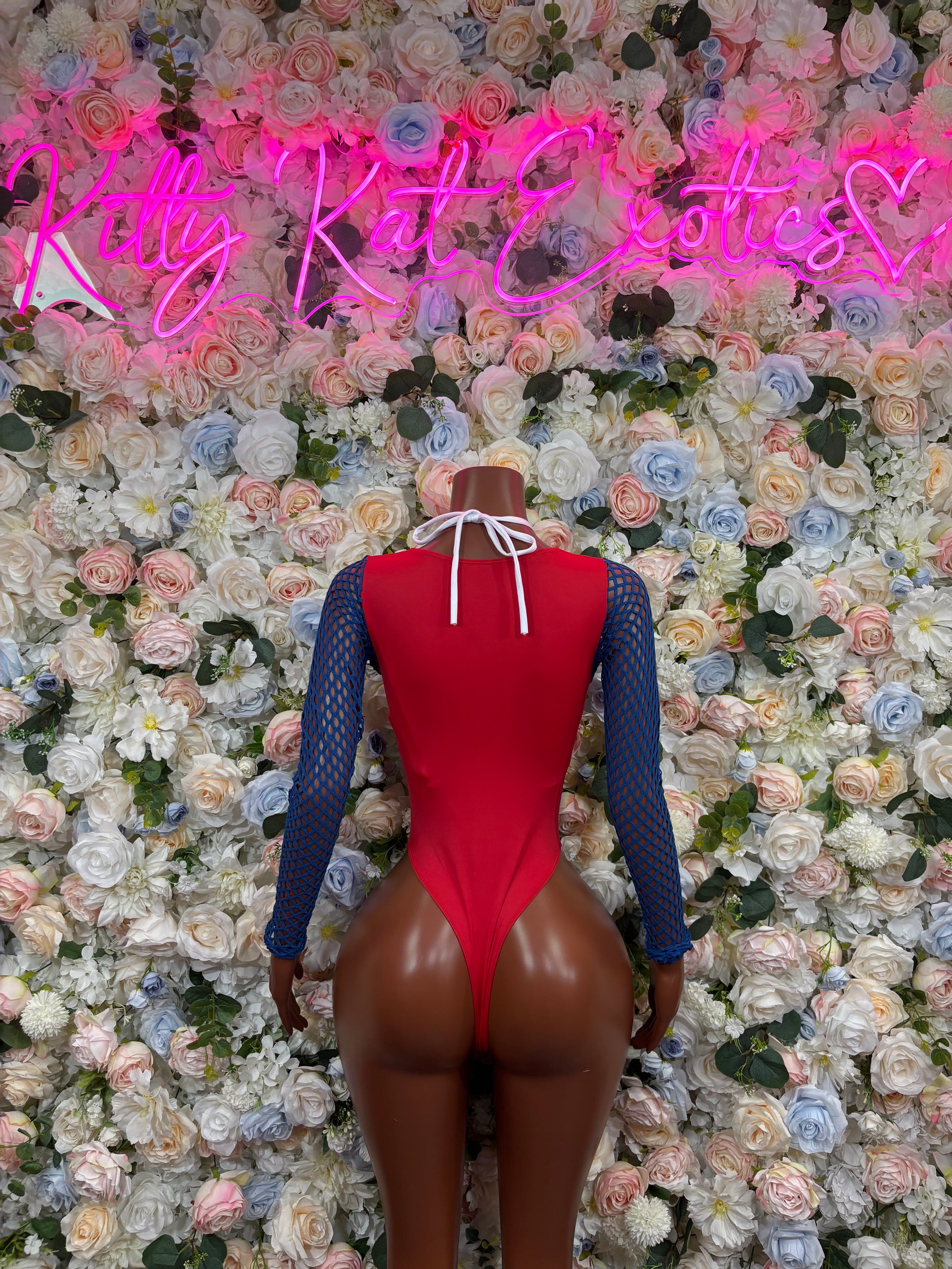 Red bodysuit with back tie and blue mesh long sleeves