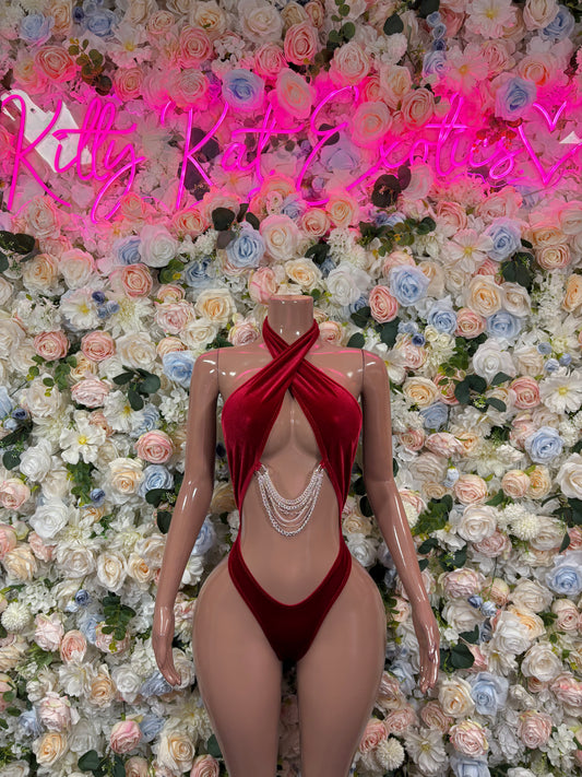 Red velvet halter one-piece bodysuit with draped front and chain fringe detail