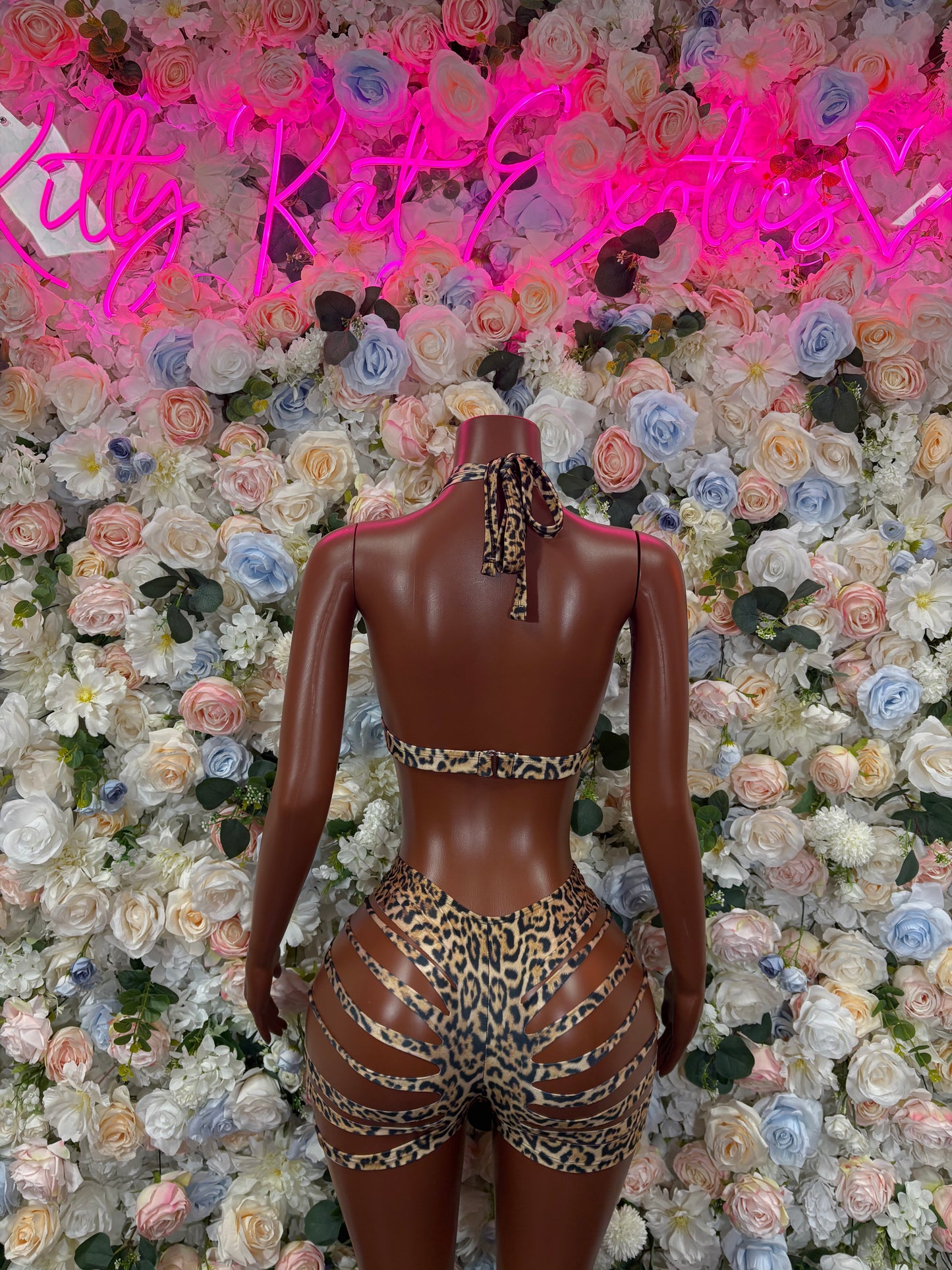 Leopard print two-piece dancewear costume with back straps and matching shorts