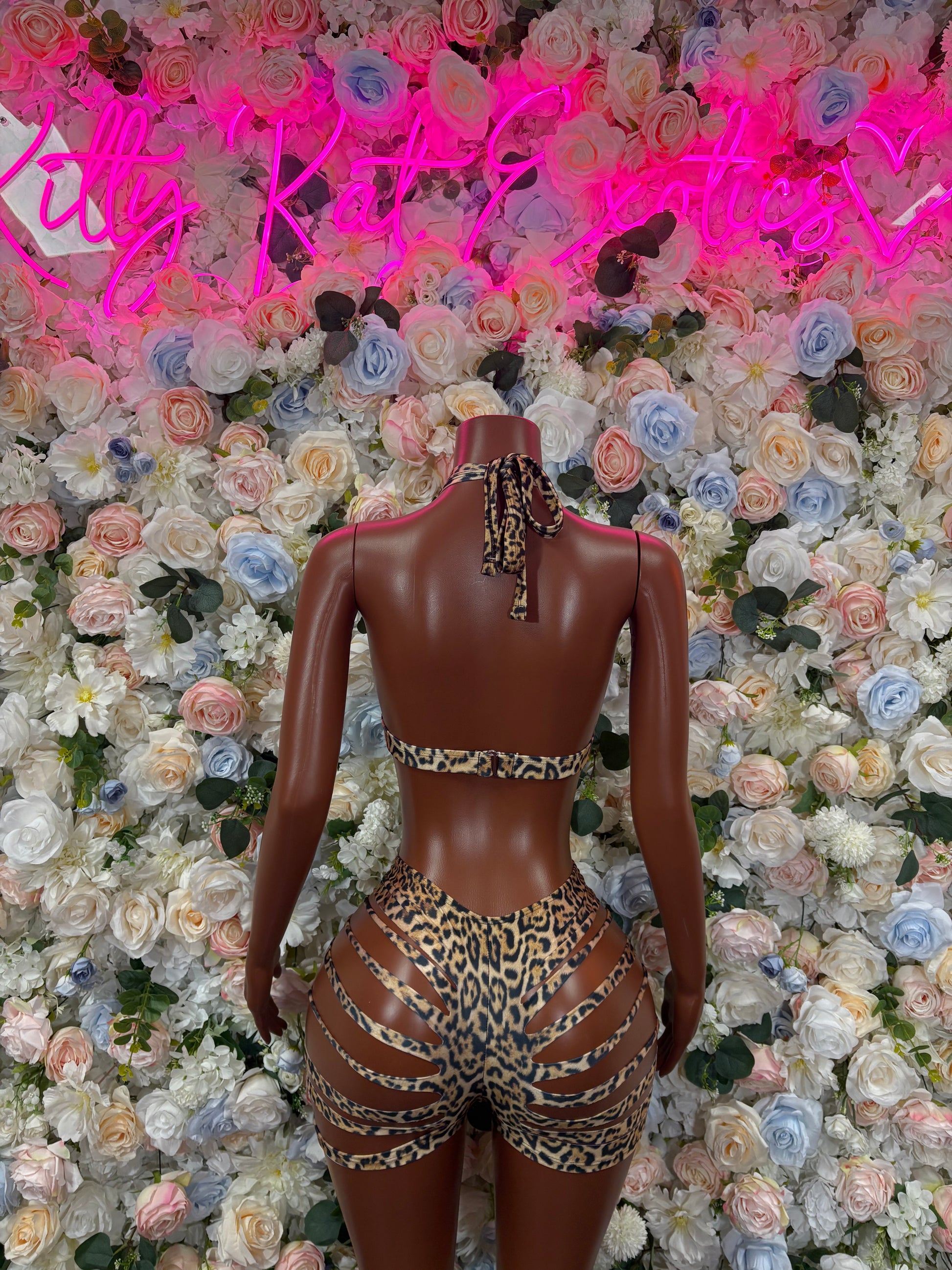 Leopard print two-piece dancewear costume with back straps and matching shorts