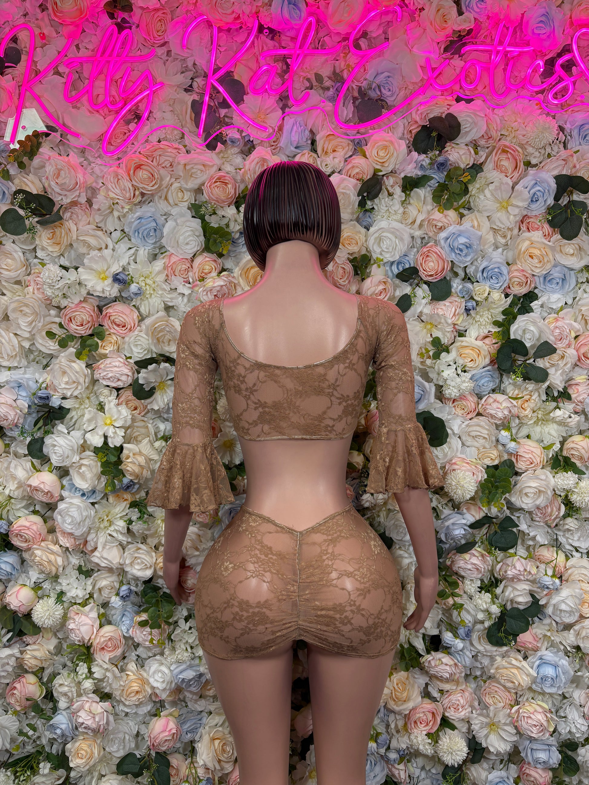 Nude lace two-piece dancewear set, back view, long bell sleeves with matching bottoms