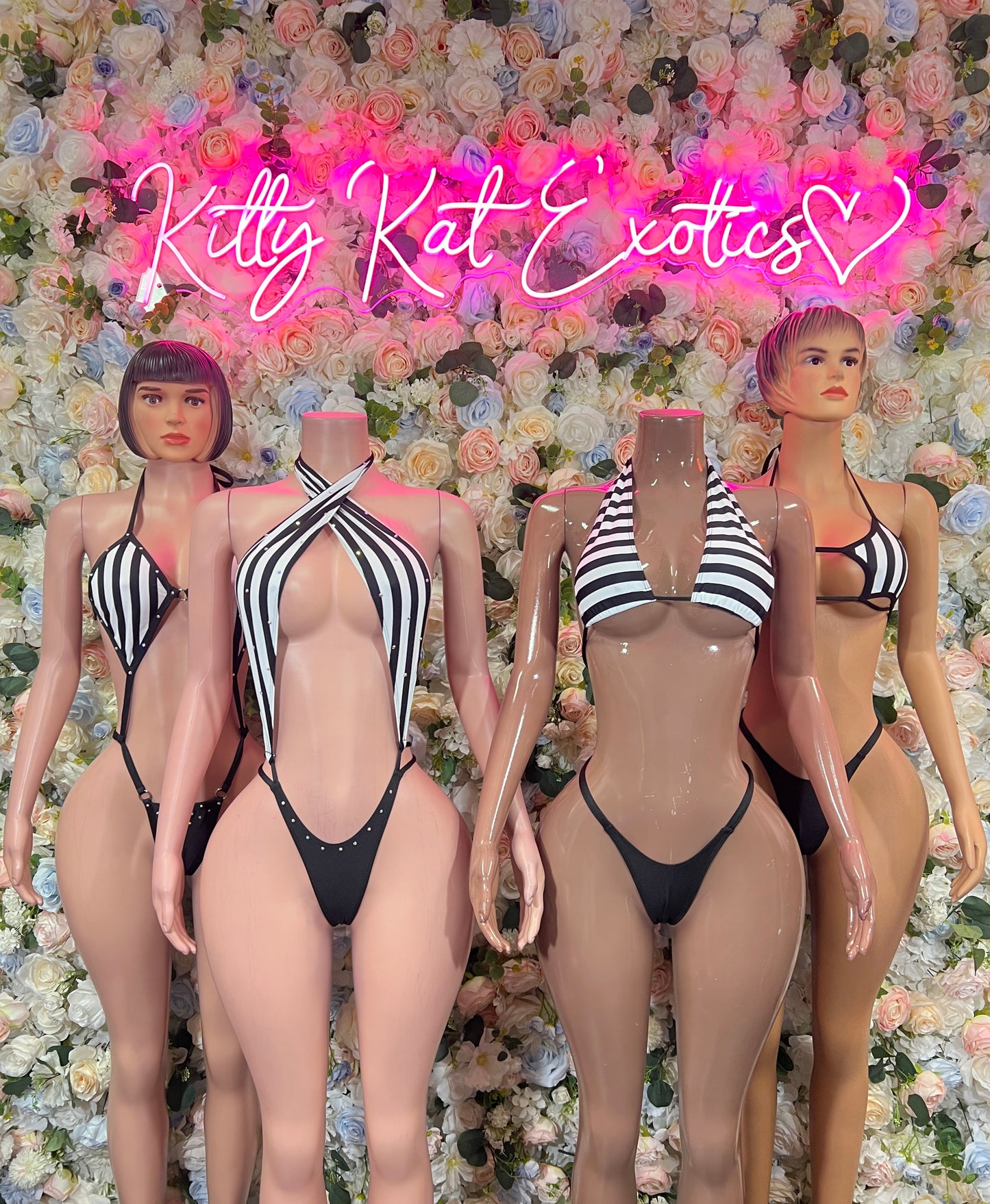 Black and white striped halter bikini with V-neck top and string bottoms