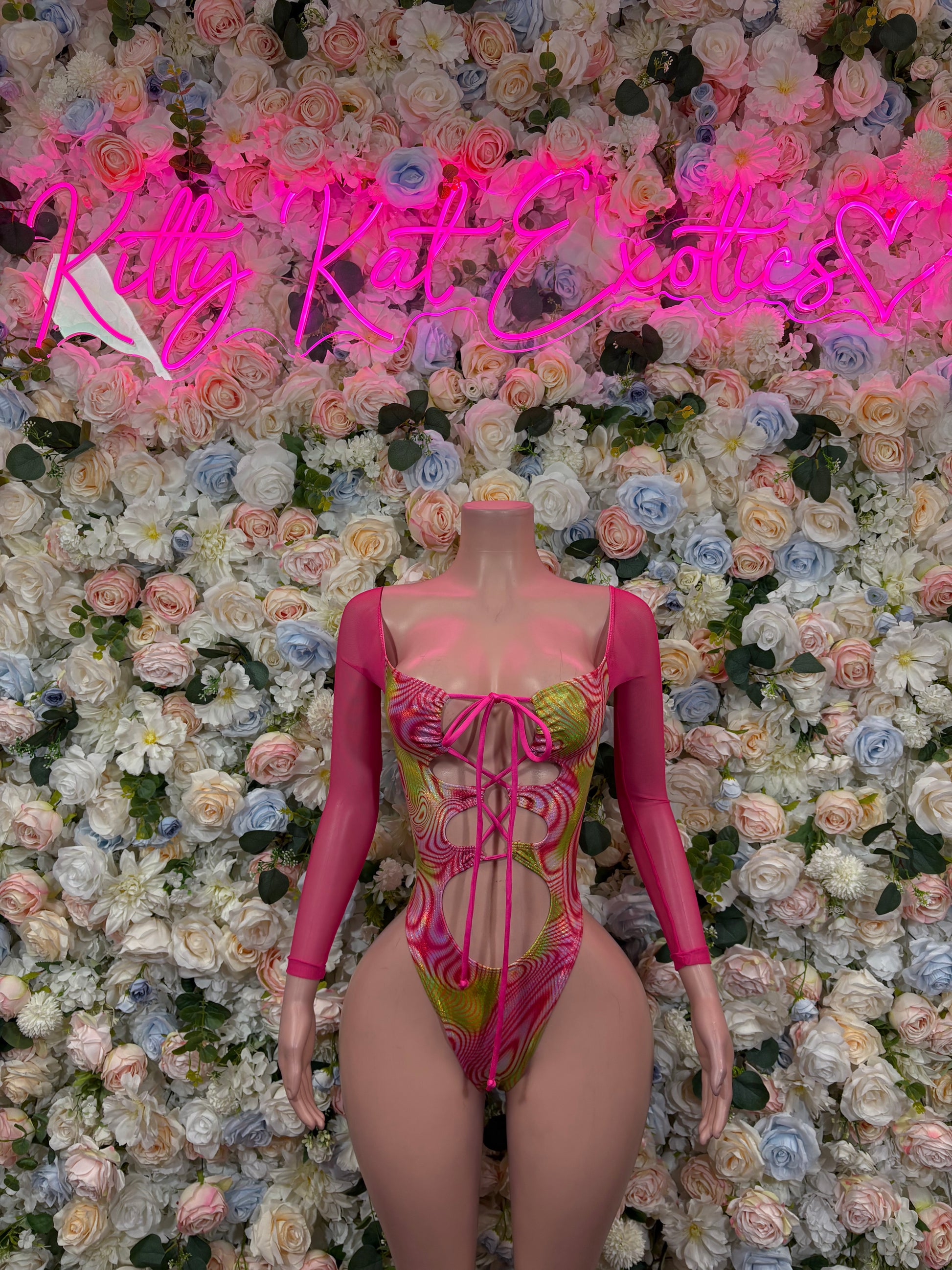 Pink metallic hologram long-sleeve lace-up bodysuit with thong-style bottom