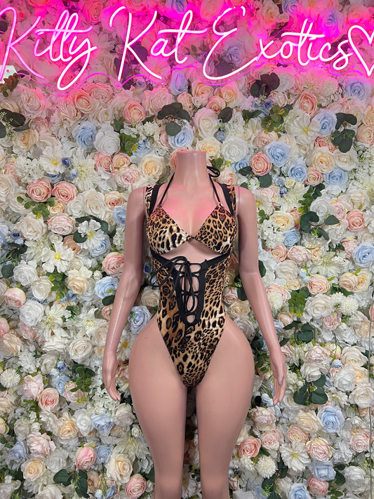 Leopard print high-cut bodysuit with V-neck and front lace-up