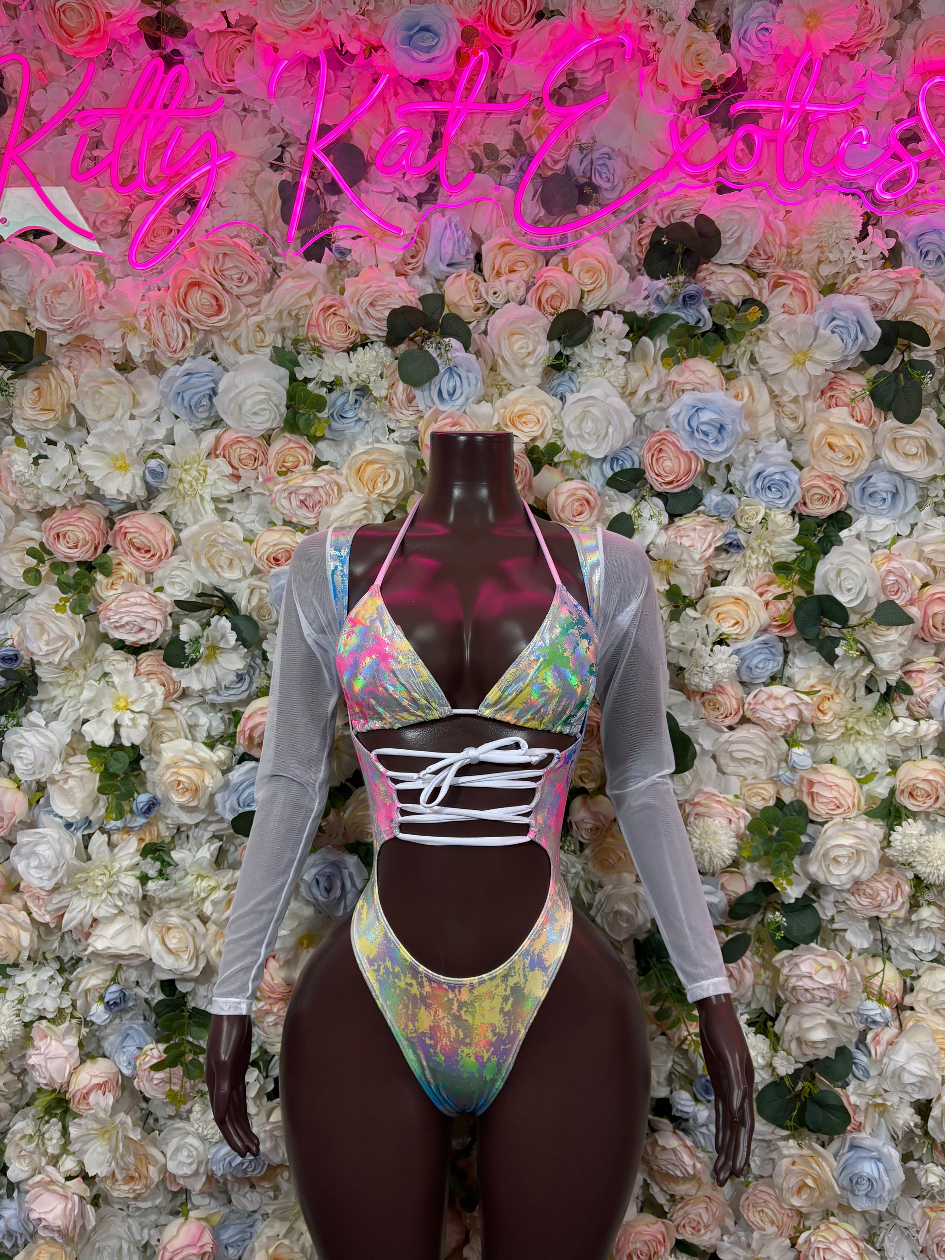 Rainbow hologram bodysuit with long sleeves, lace-up chest cutout, high-leg