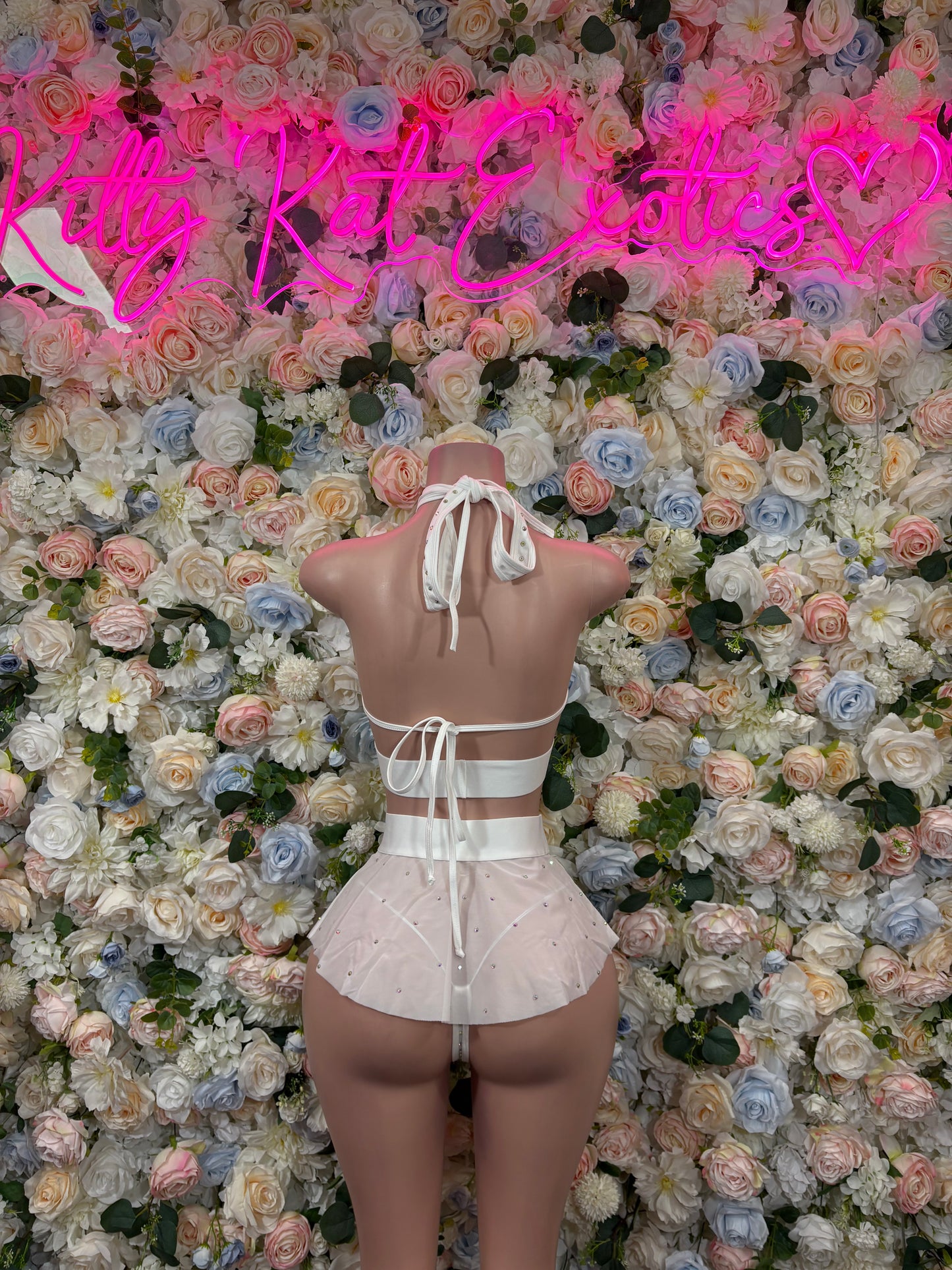 White rhinestone halter crop top with tie back and sheer ruffle mini skirt set