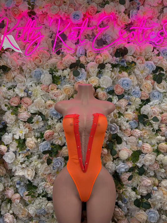Orange one-piece dance bodysuit with deep V back and high-cut legs