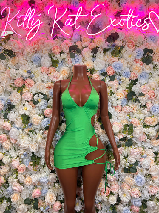 Green mini dress with V-neck halter, ruched fabric, and side tie cutouts