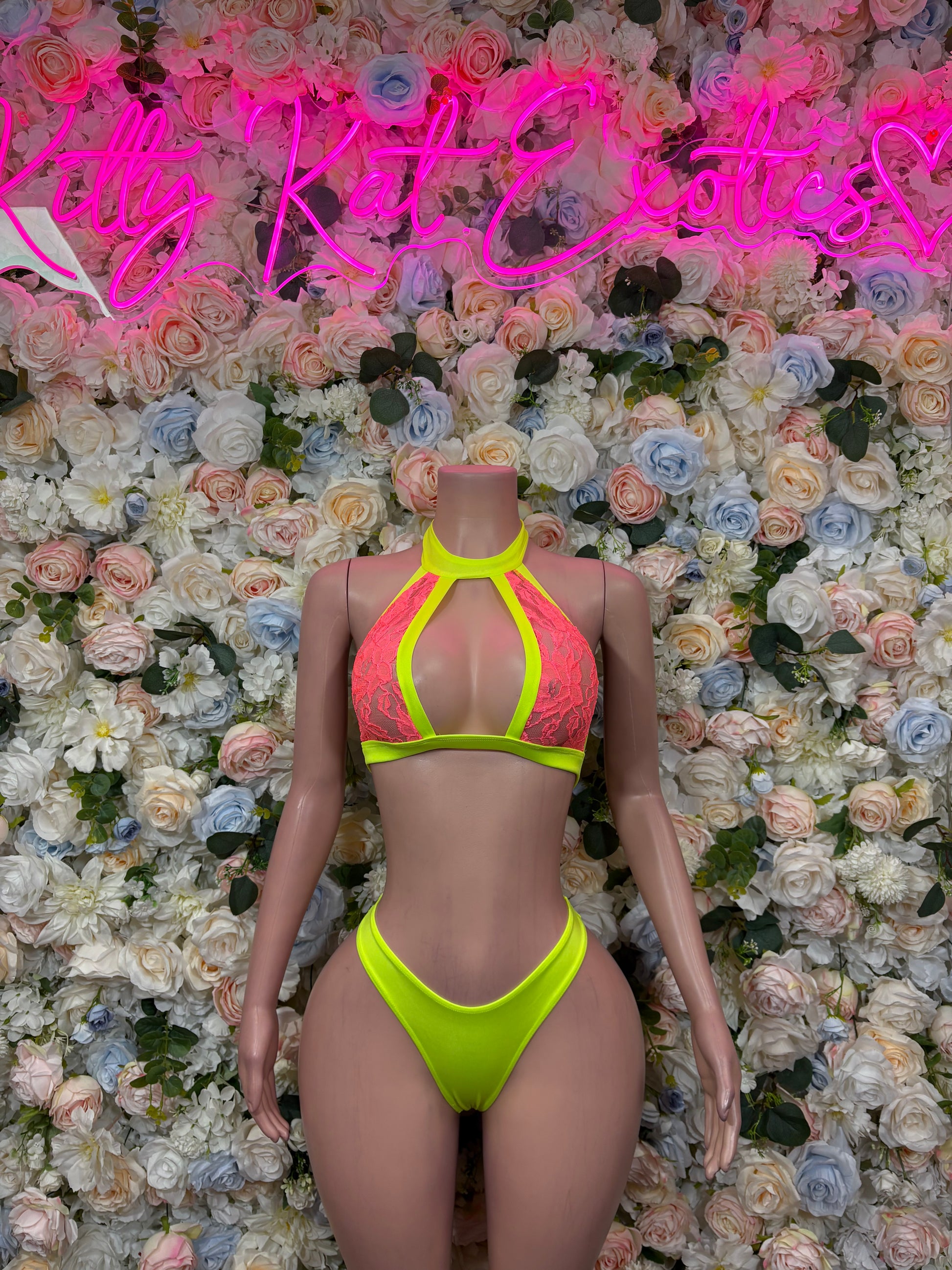 Neon green halter bikini set with triangle top and high-cut bottoms