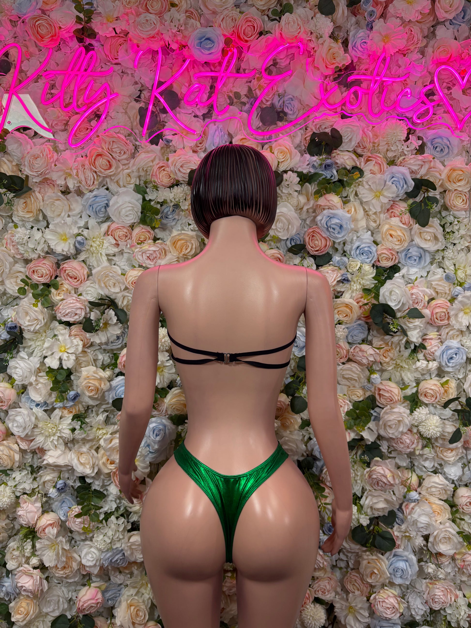 Green bikini two-piece set, strappy back and high-cut bottoms