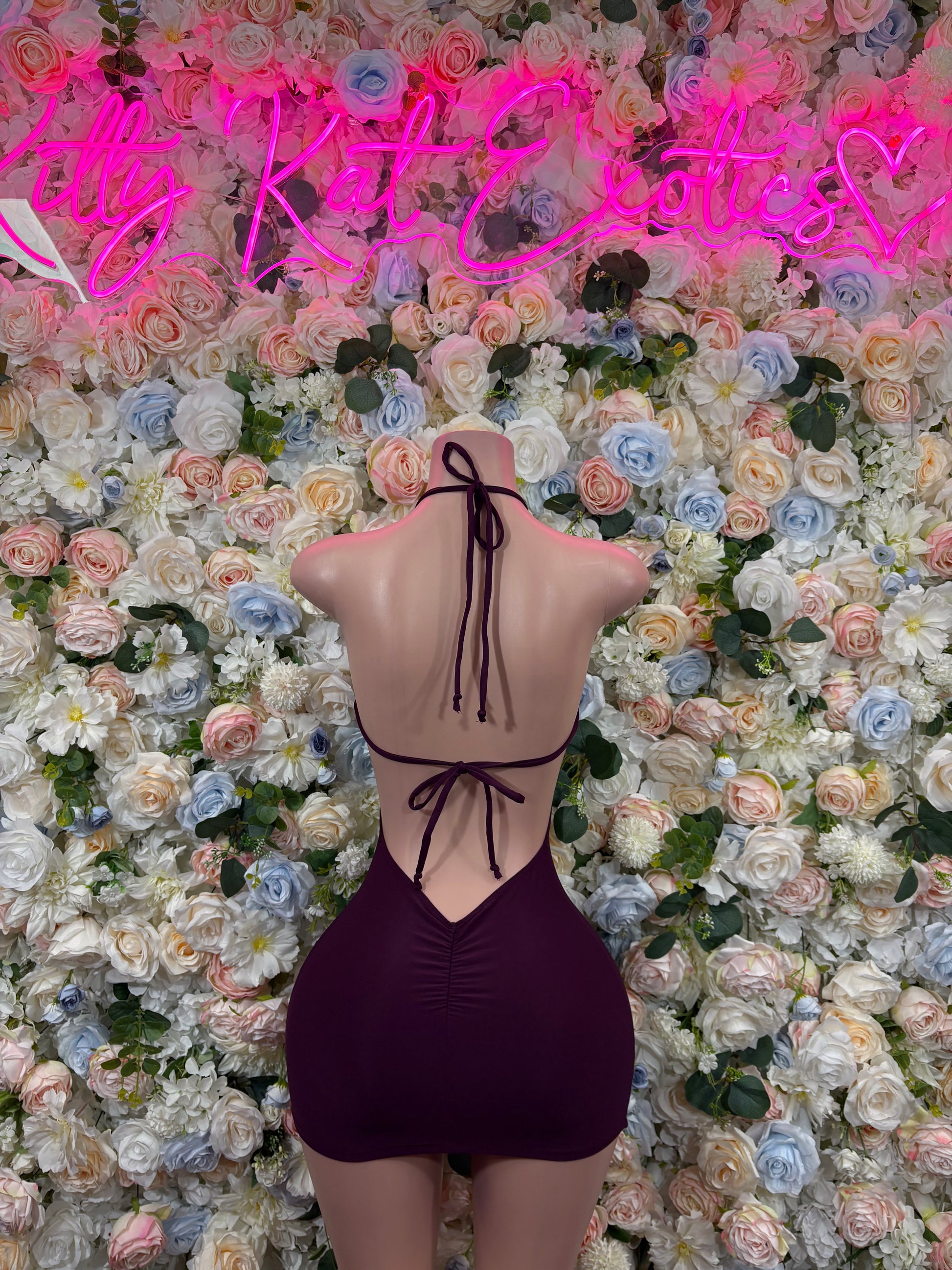 Purple backless mini dress with tie straps and cutout ribbed front