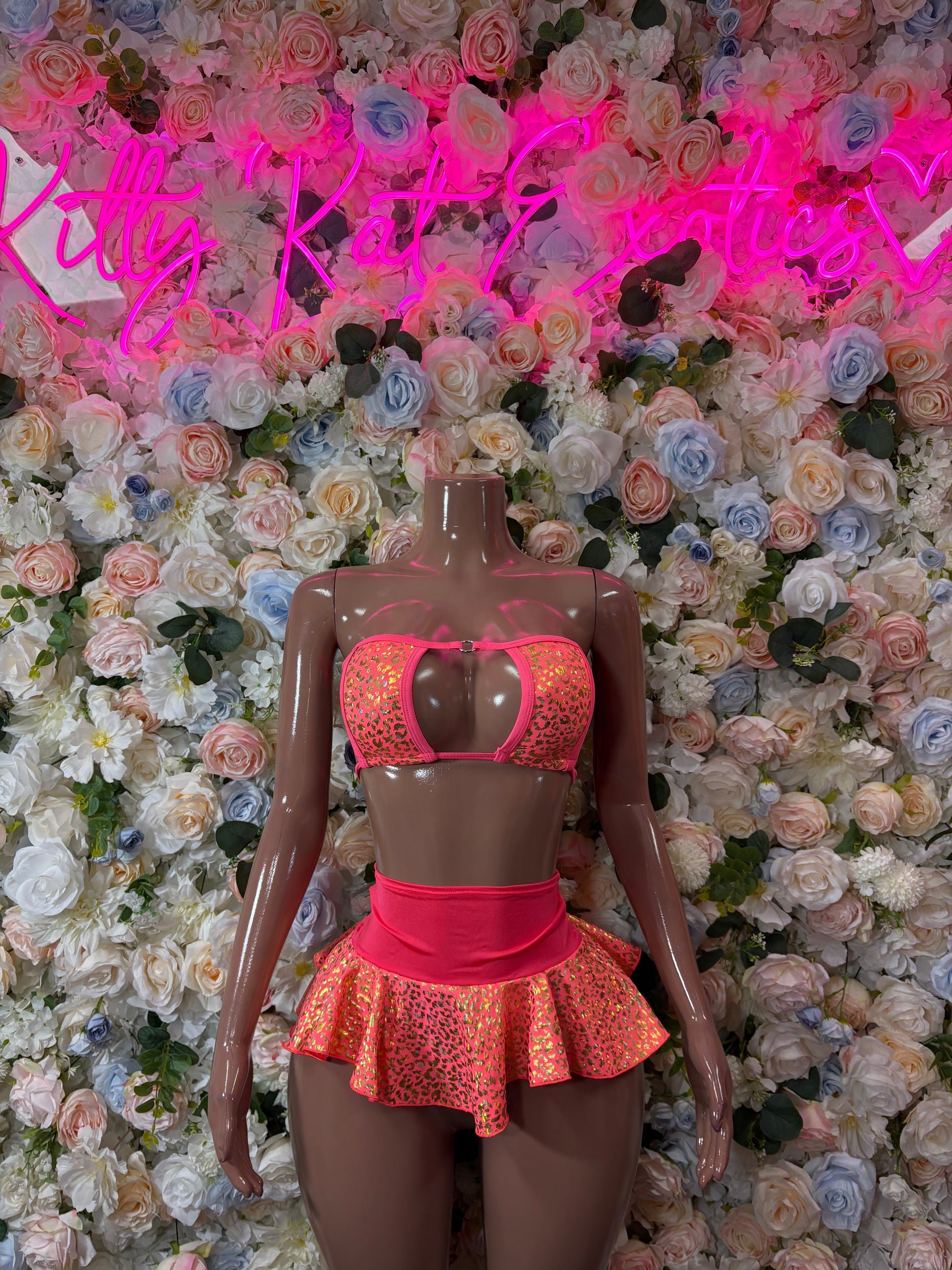 Coral patterned two-piece dance skirt set with ruffled peplum and off-shoulder top