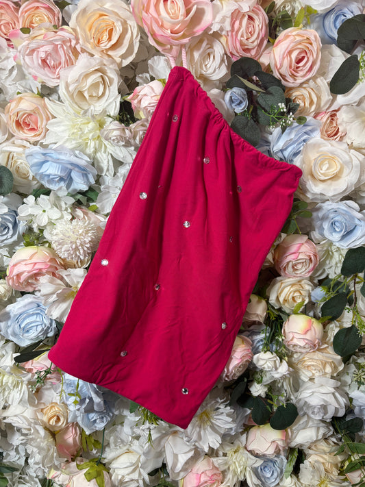Fuchsia fabric money pouch with silver grommets and angled opening