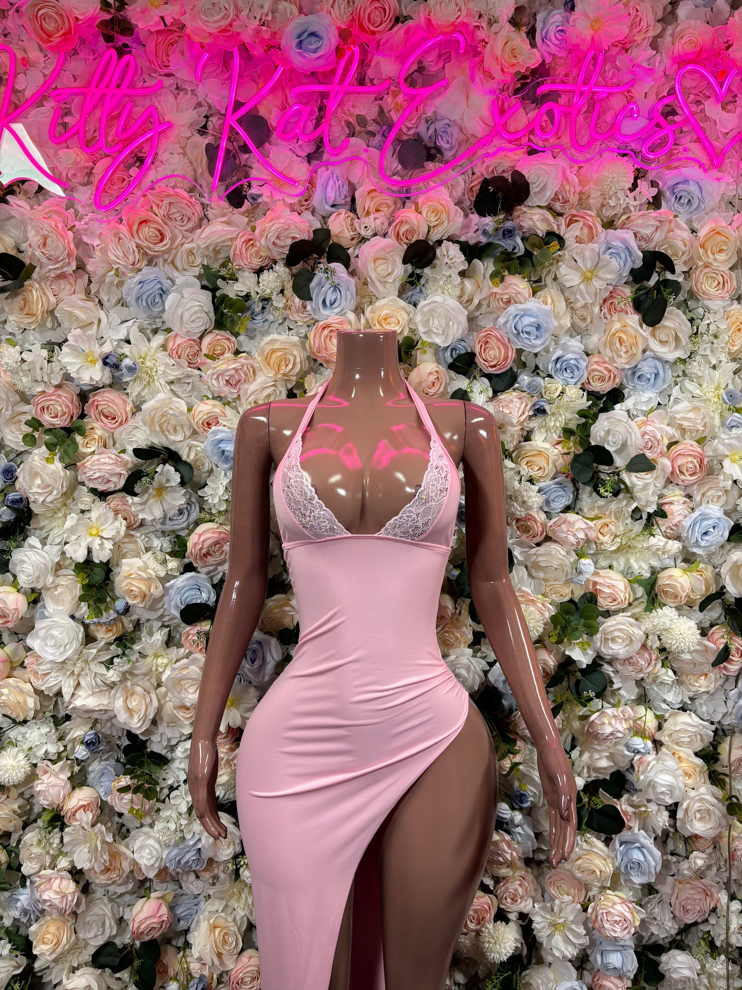 Baby pink satin maxi gown with lace V-neck and fitted body