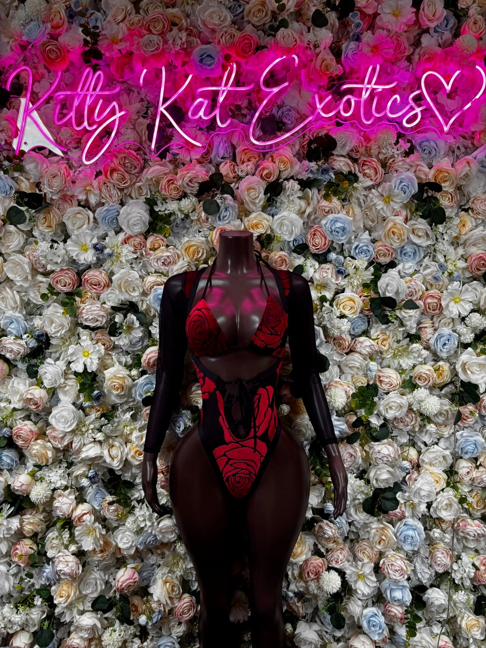Black sheer bodysuit with long sleeves, lace trim, red rose print front cutout