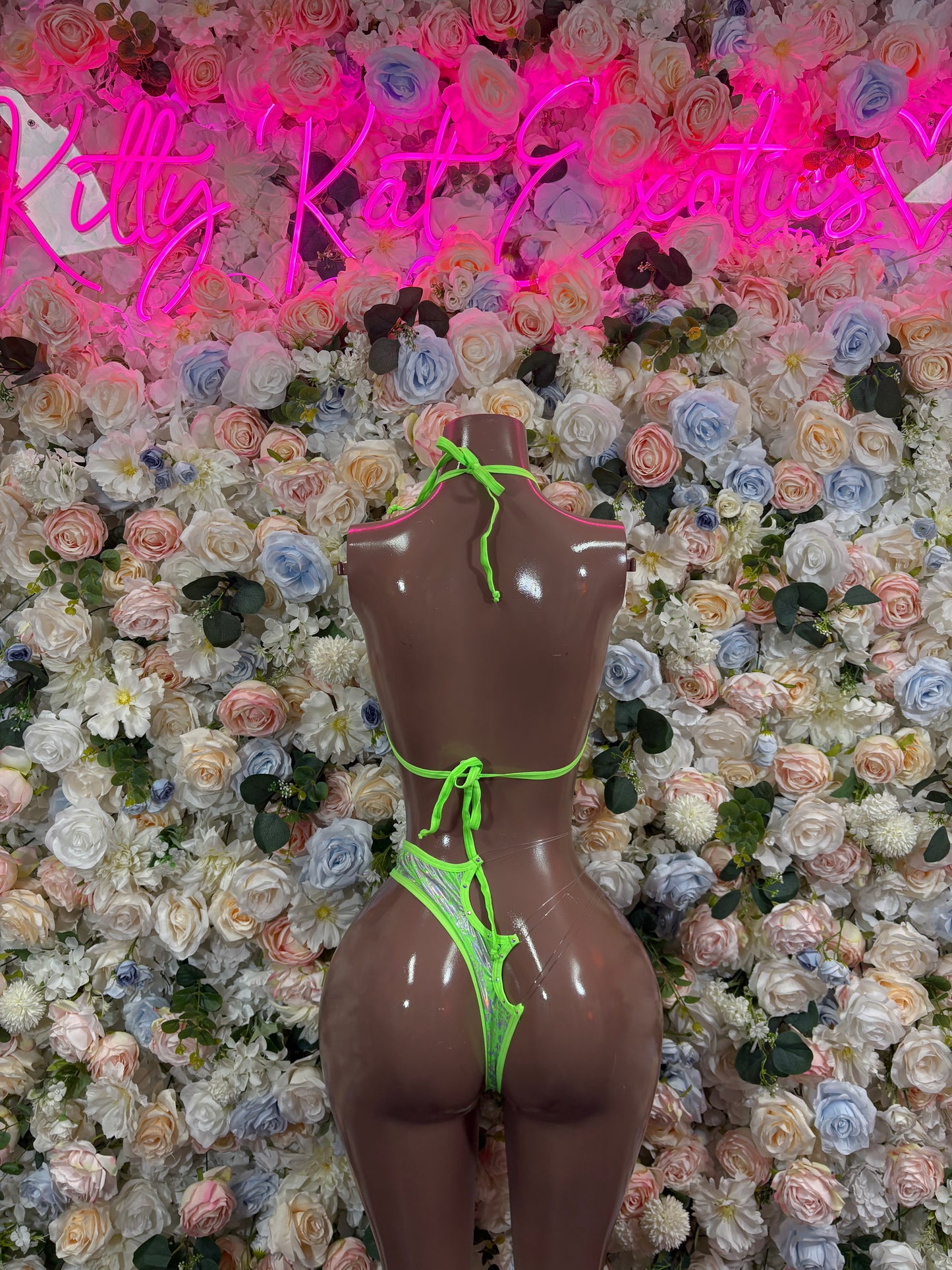 Neon hologram bikini set with green triangle top and matching high-cut bottoms
