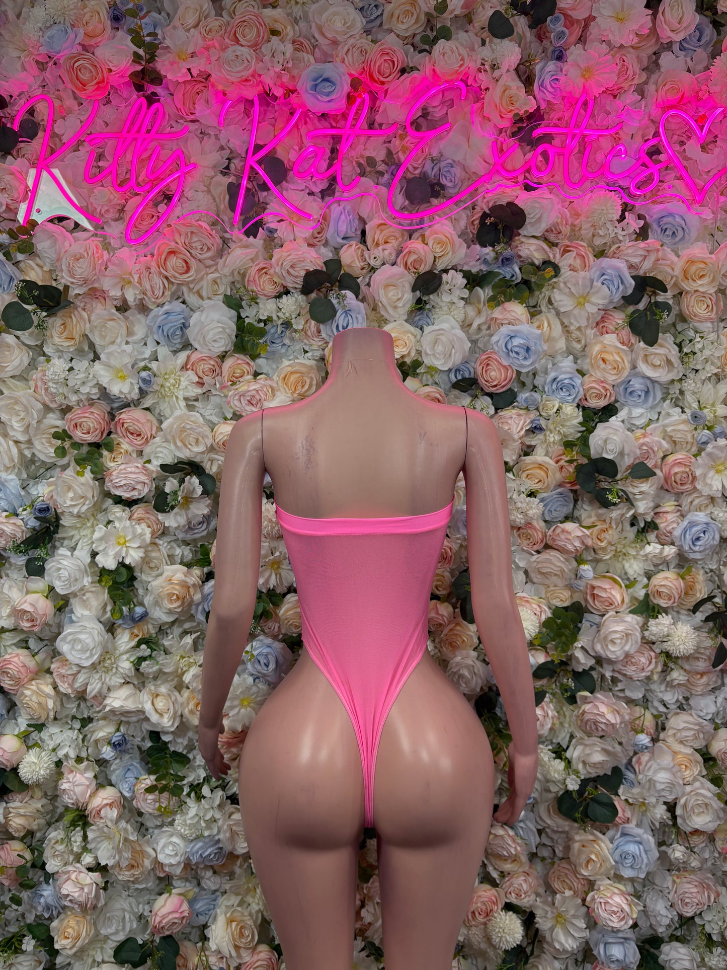 Hot pink V-neck backless bodysuit with thin straps