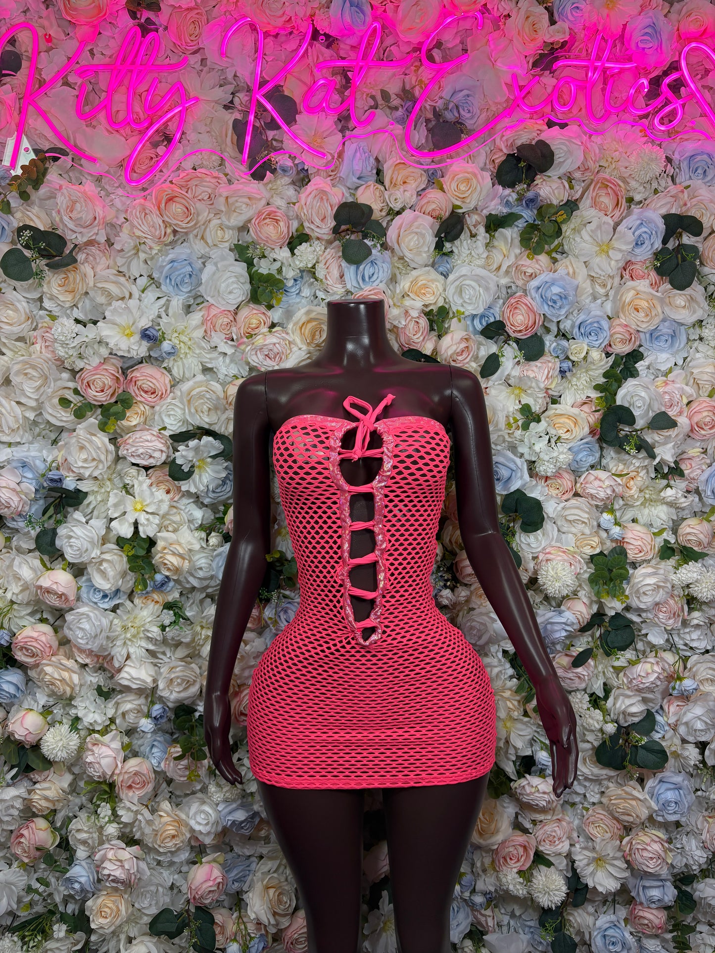 Coral fishnet corset dress with lace-up front, strapless sweetheart neckline