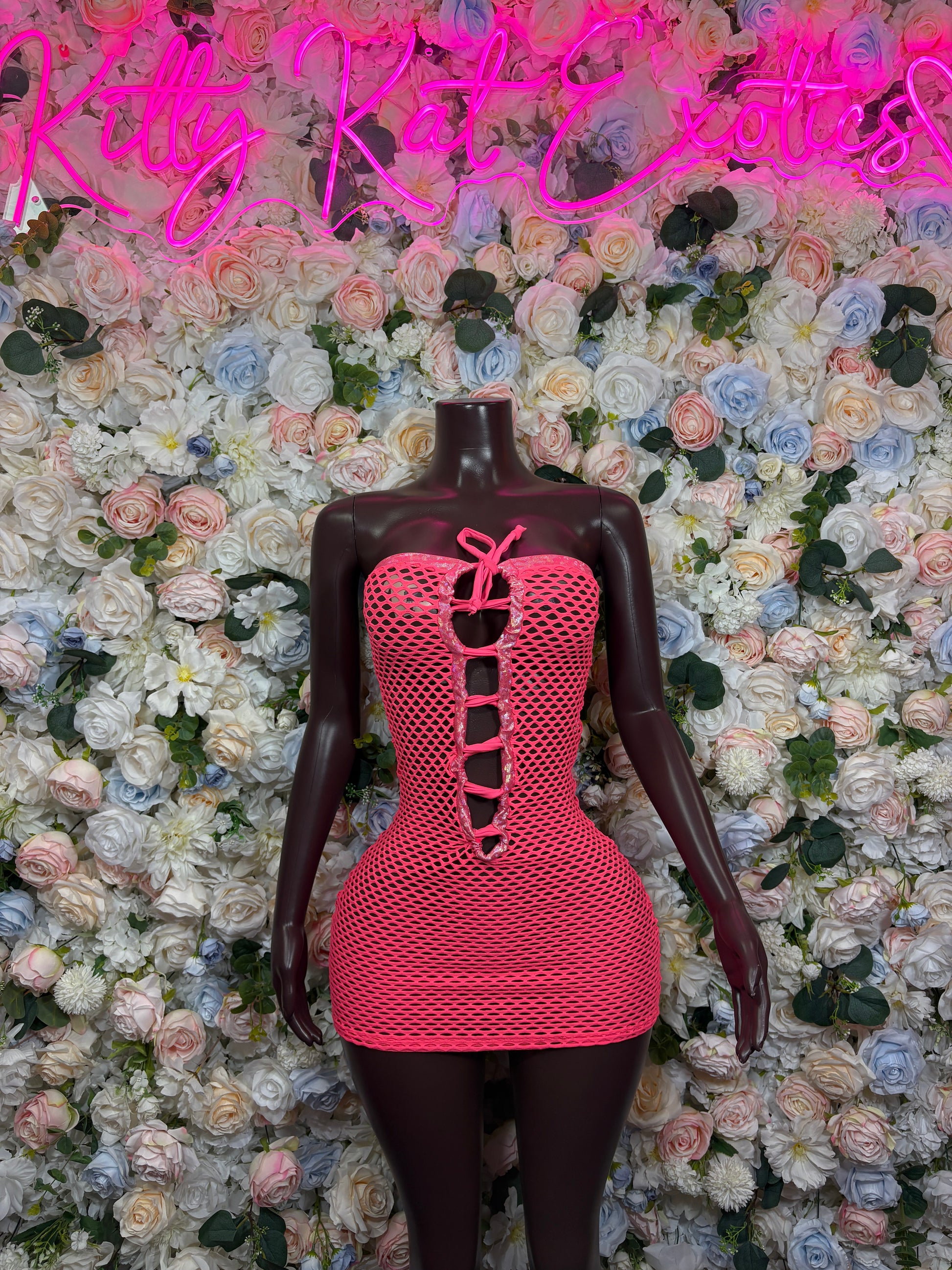 Coral fishnet corset dress with lace-up front, strapless sweetheart neckline