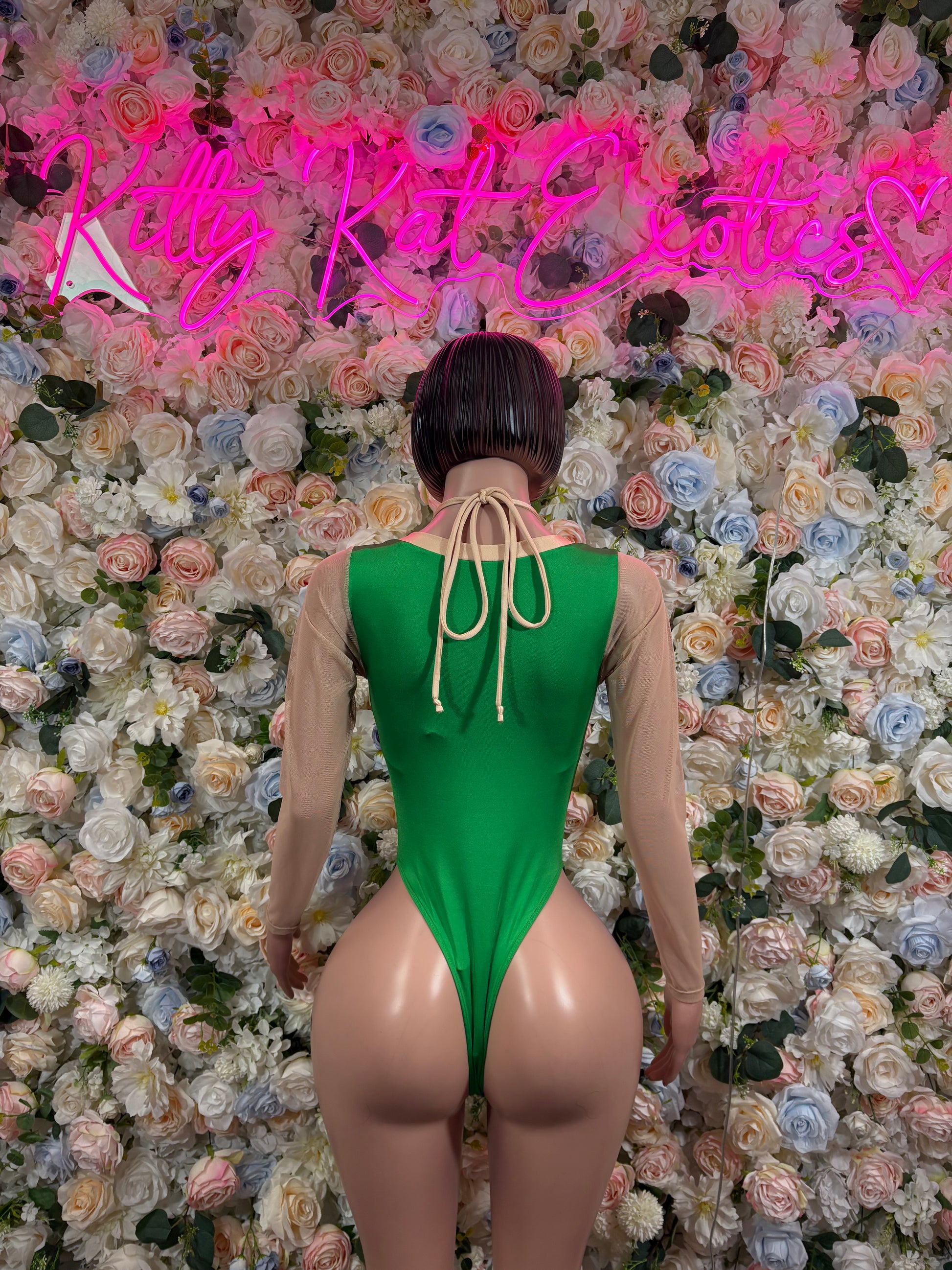 Green bodysuit with open back and center lace-up tie