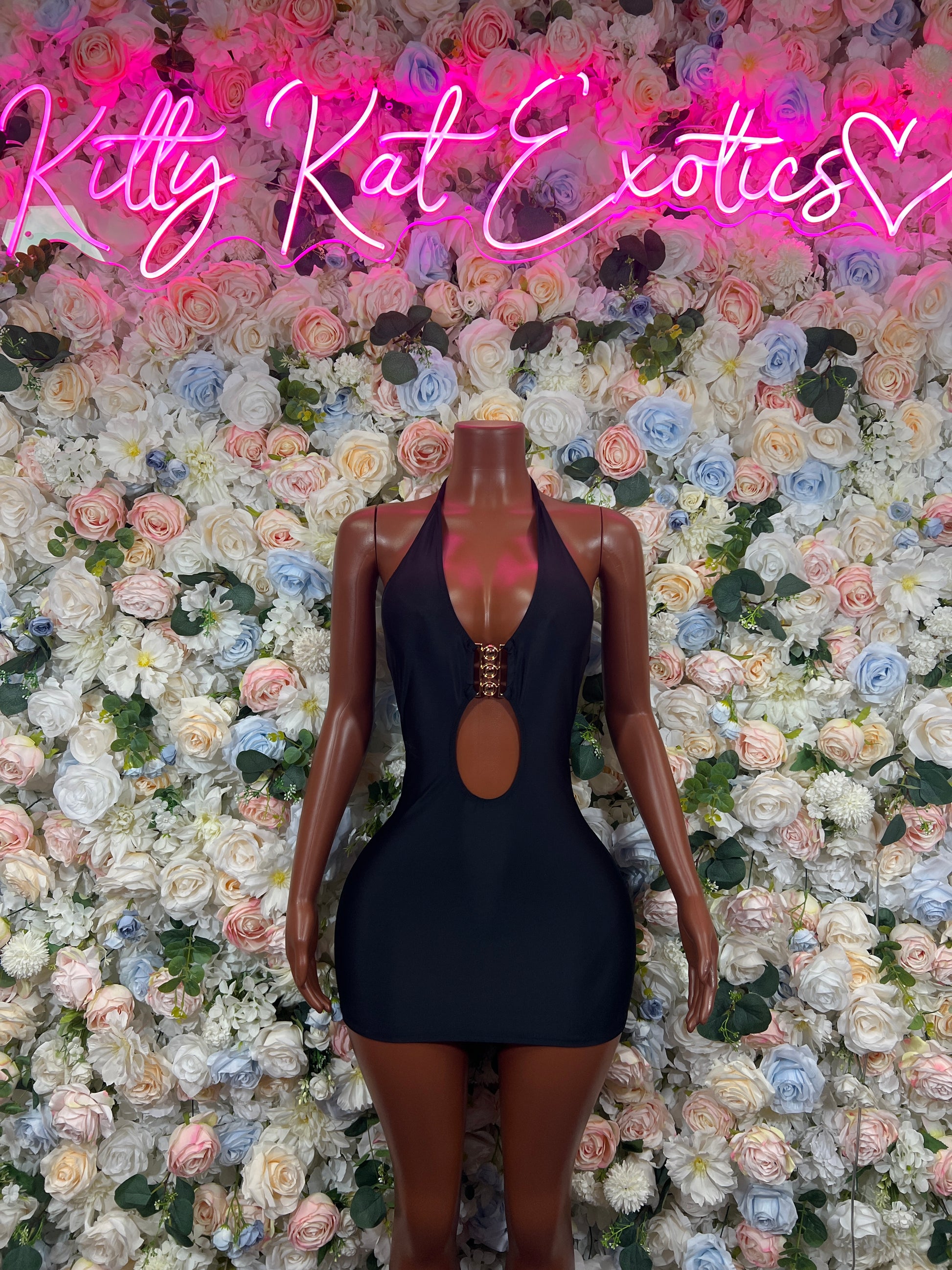 Black mini club dress with halter straps and center chest keyhole cutout