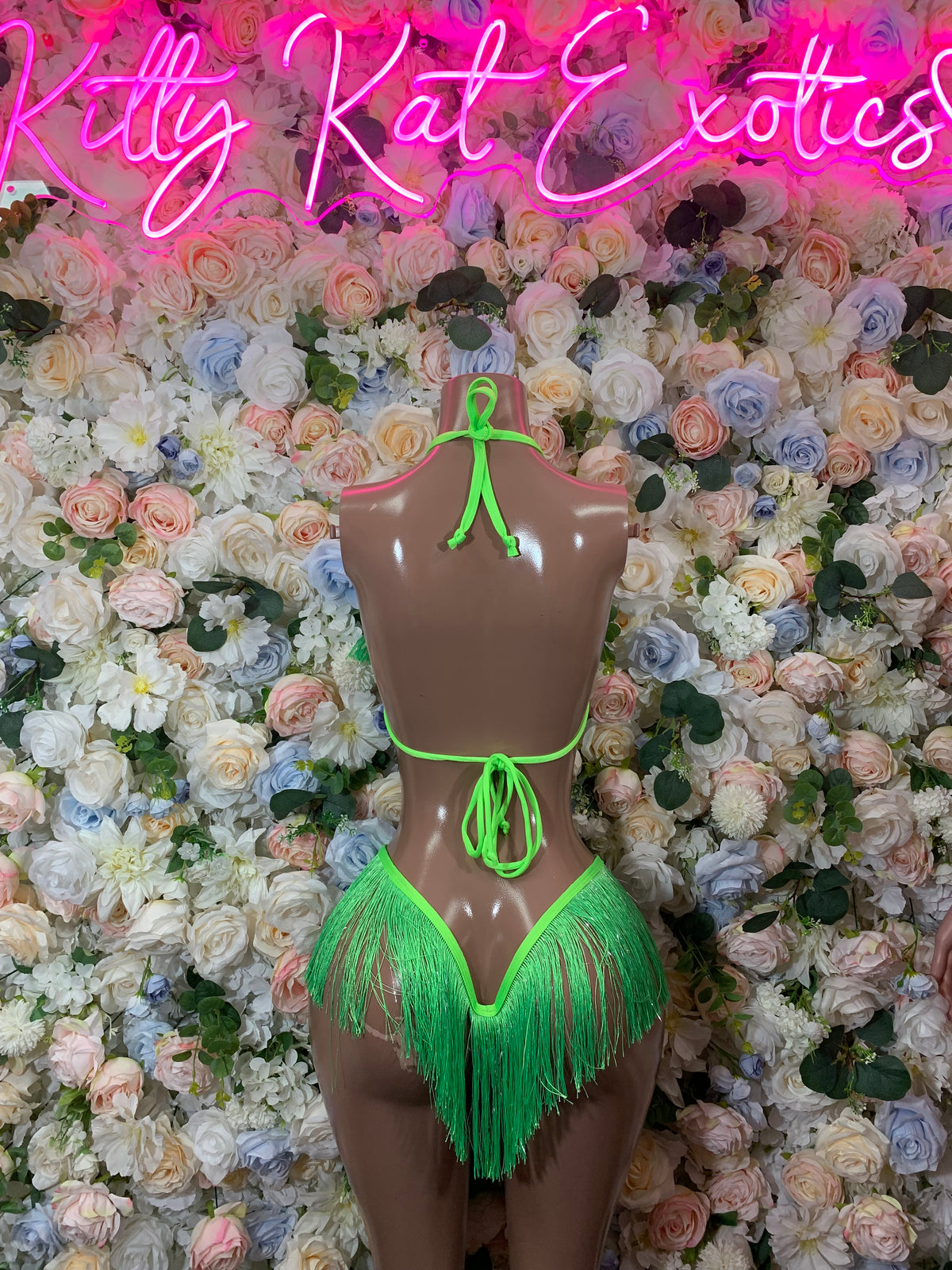 Neon green fringe halter bodysuit with matching thong bottoms