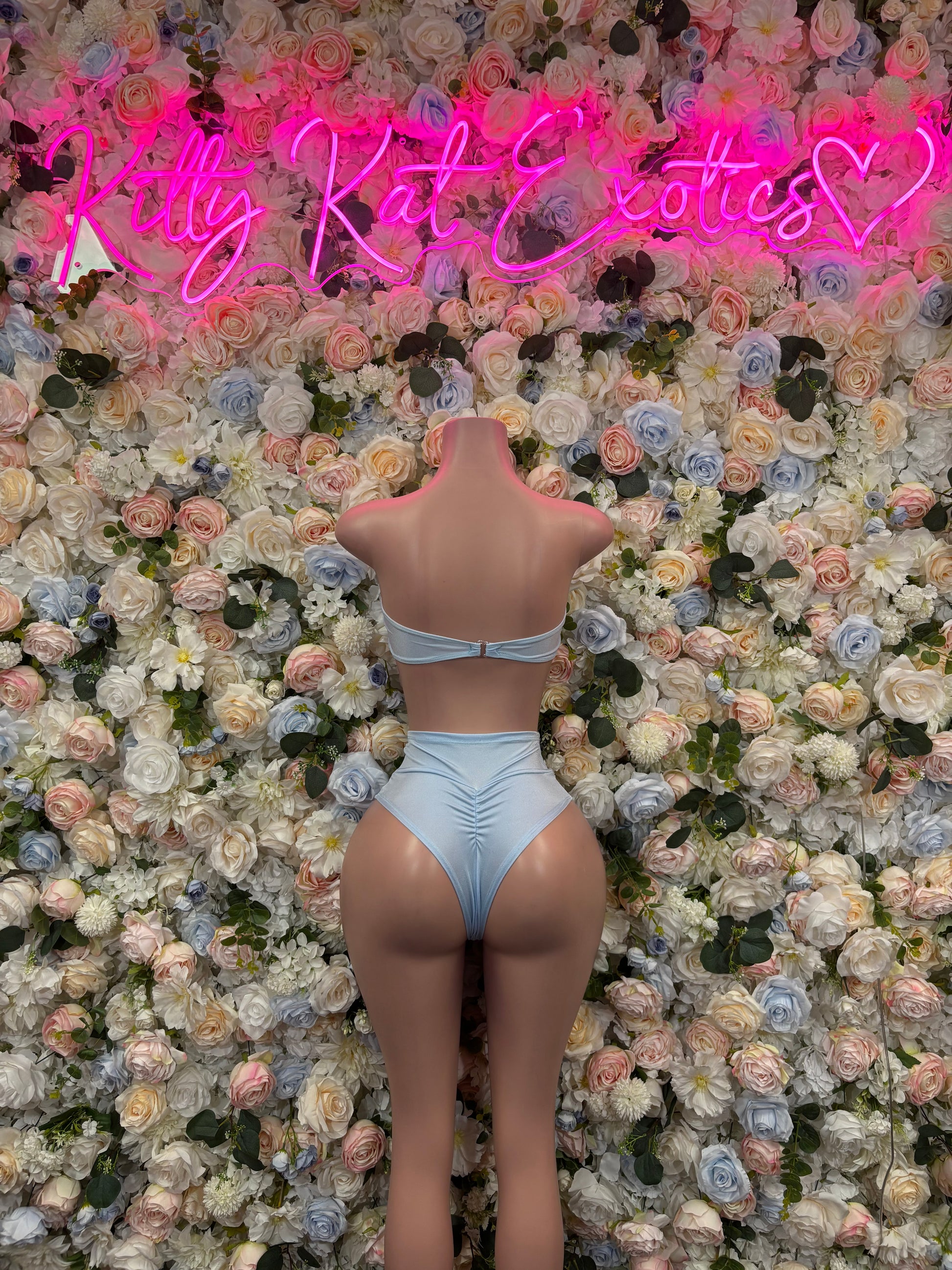 Baby blue two-piece rave outfit with bow-front bandeau bra and high-leg bottoms