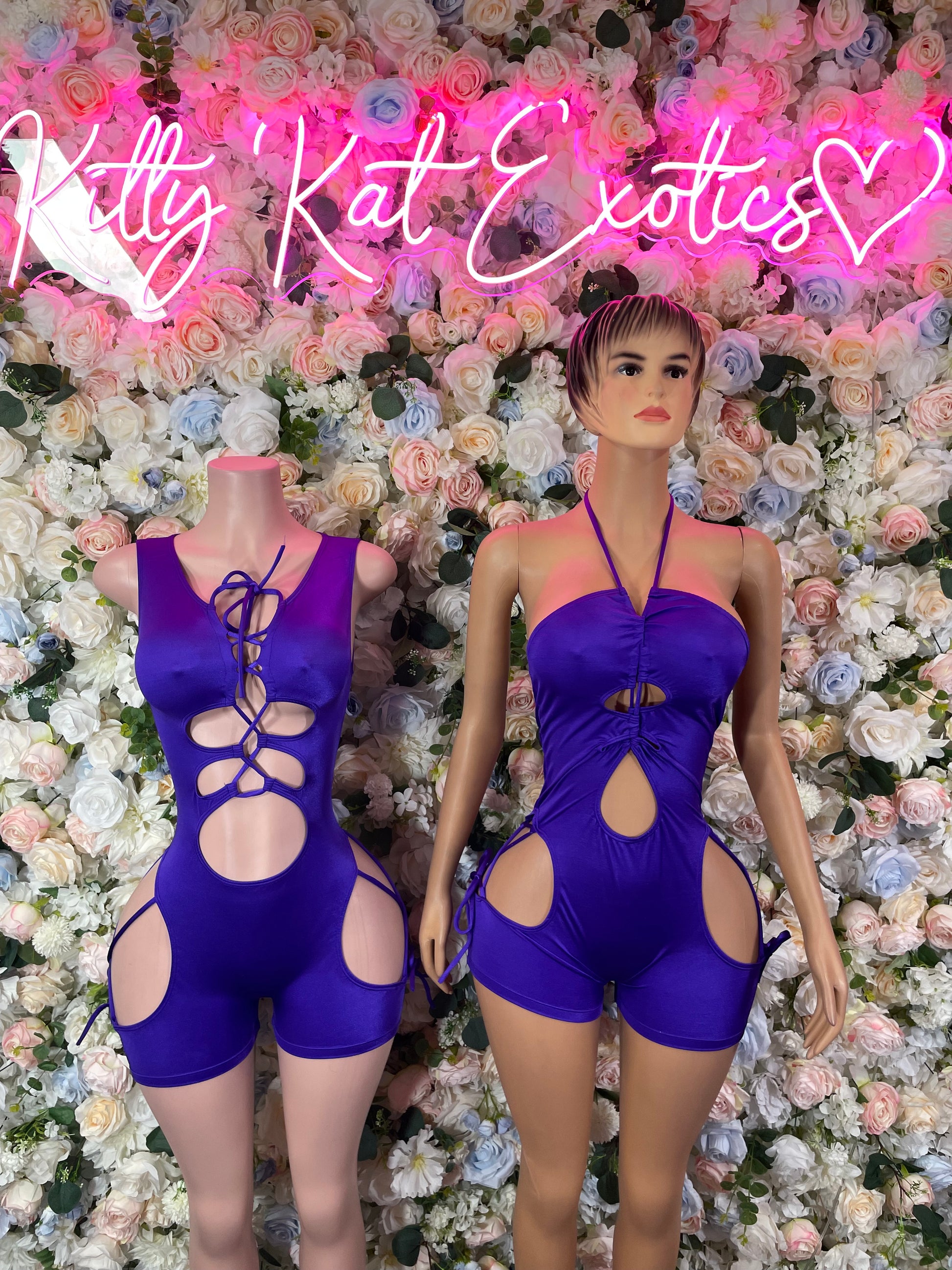 Purple halter one-piece bodysuit with lace-up back and side circle cutouts