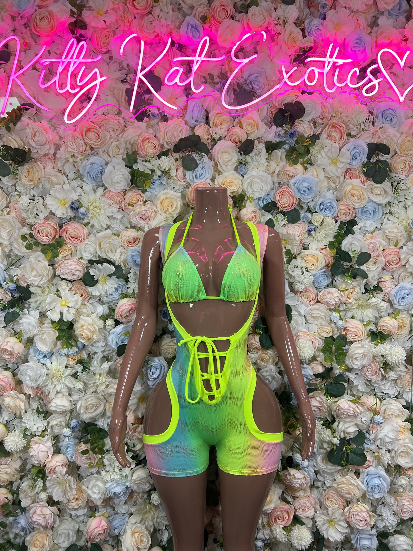 Holographic neon green lace-up bodysuit with triangle front and cheeky cut