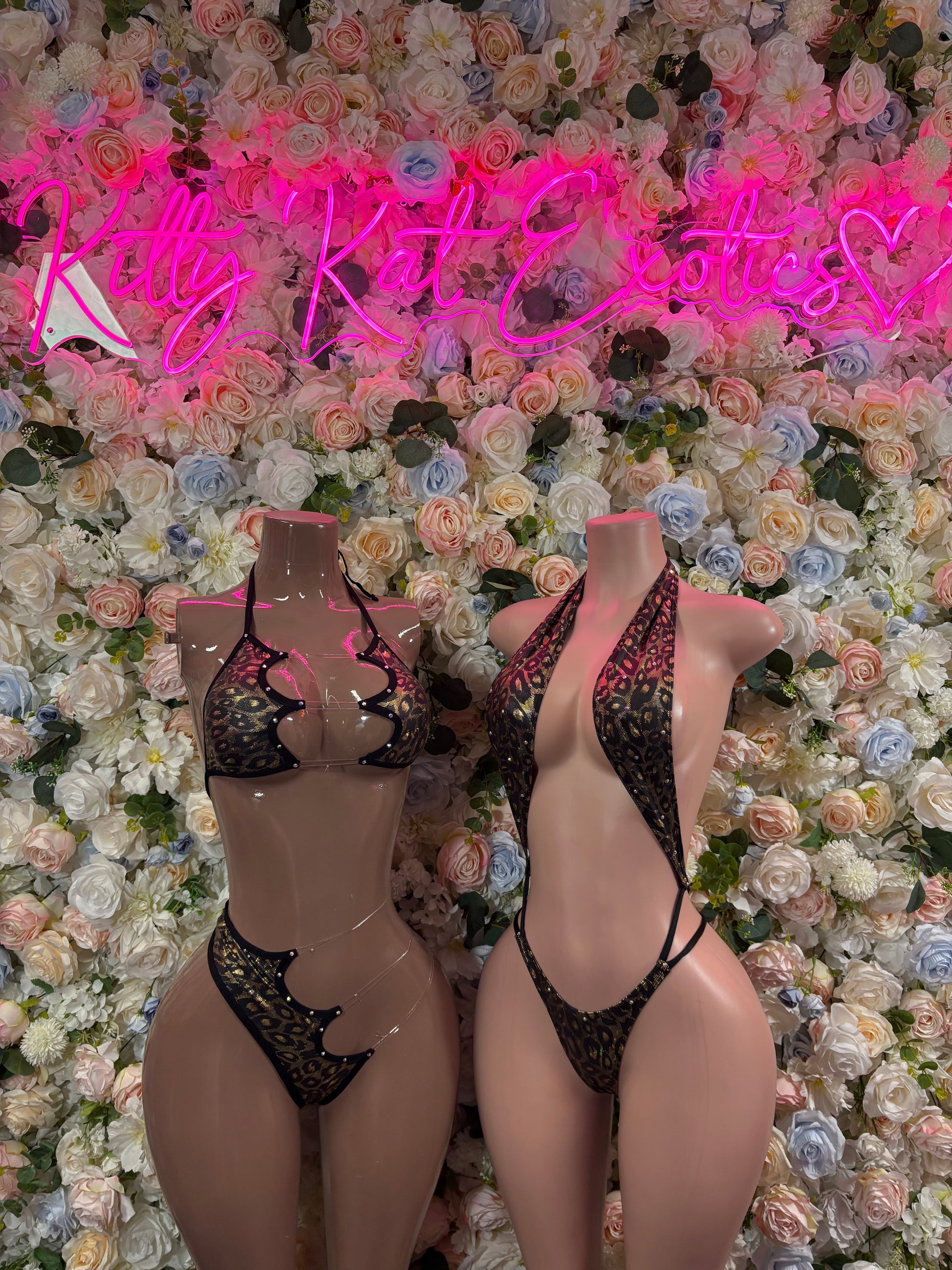 Black cheetah-print two-piece bodysuit set with open bra and high-cut bottoms