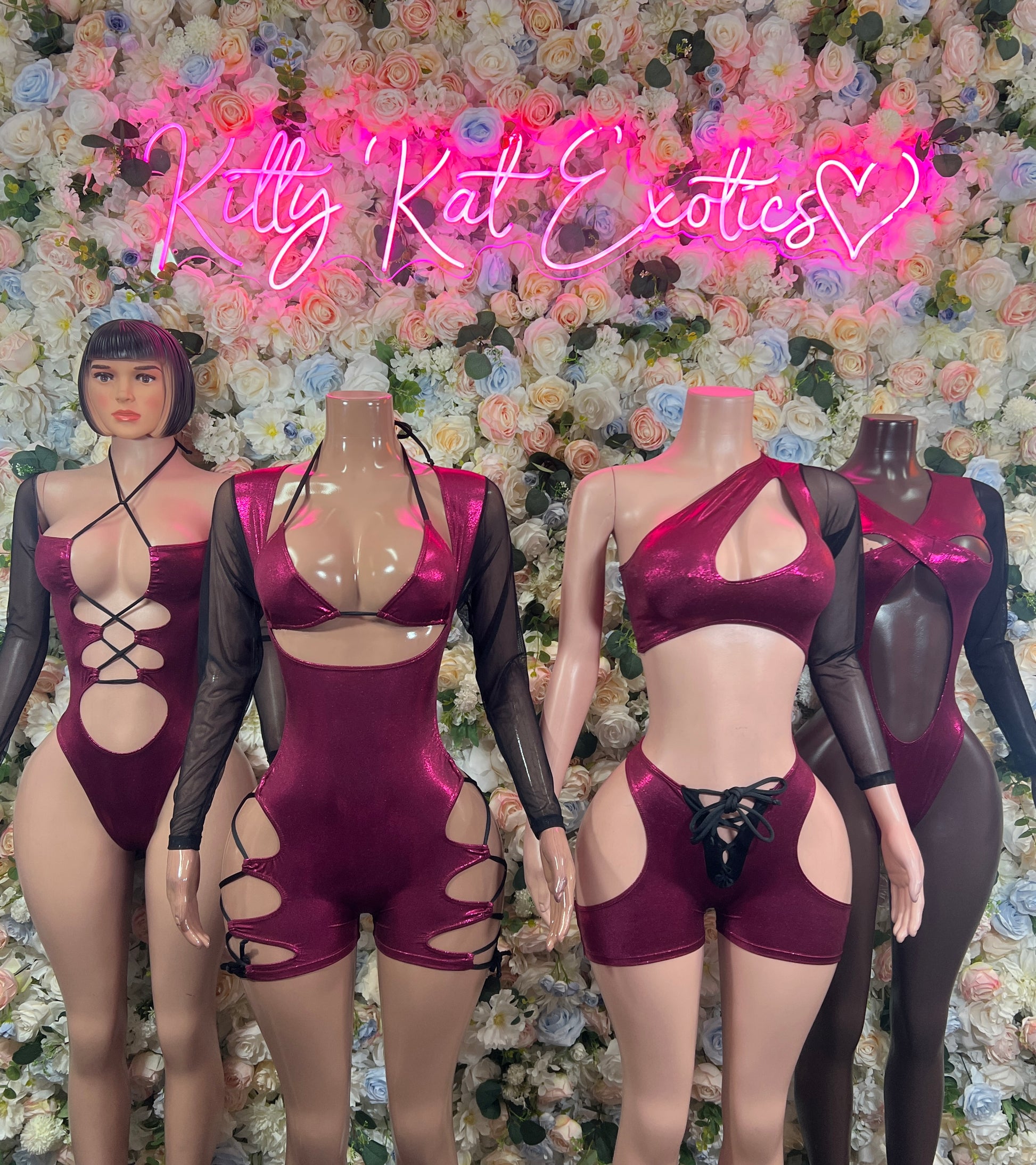 Burgundy dance bodysuit with long sheer sleeves, lace-up front and back cutouts