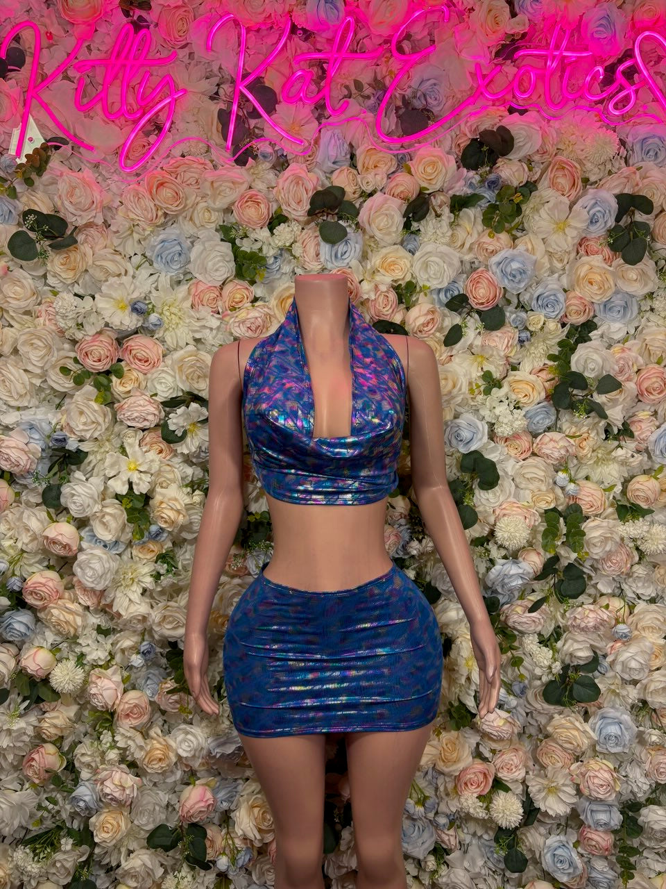 Shiny metallic halter crop top and mini skirt two-piece set, blue sleeveless front