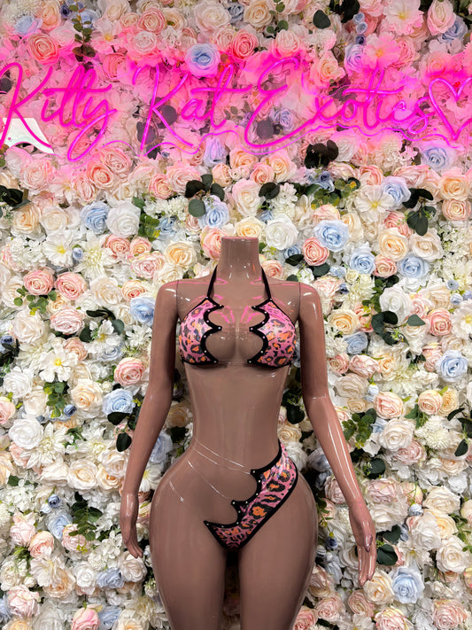 Pink leopard-print lingerie set with black trim, front view, tie-string accents