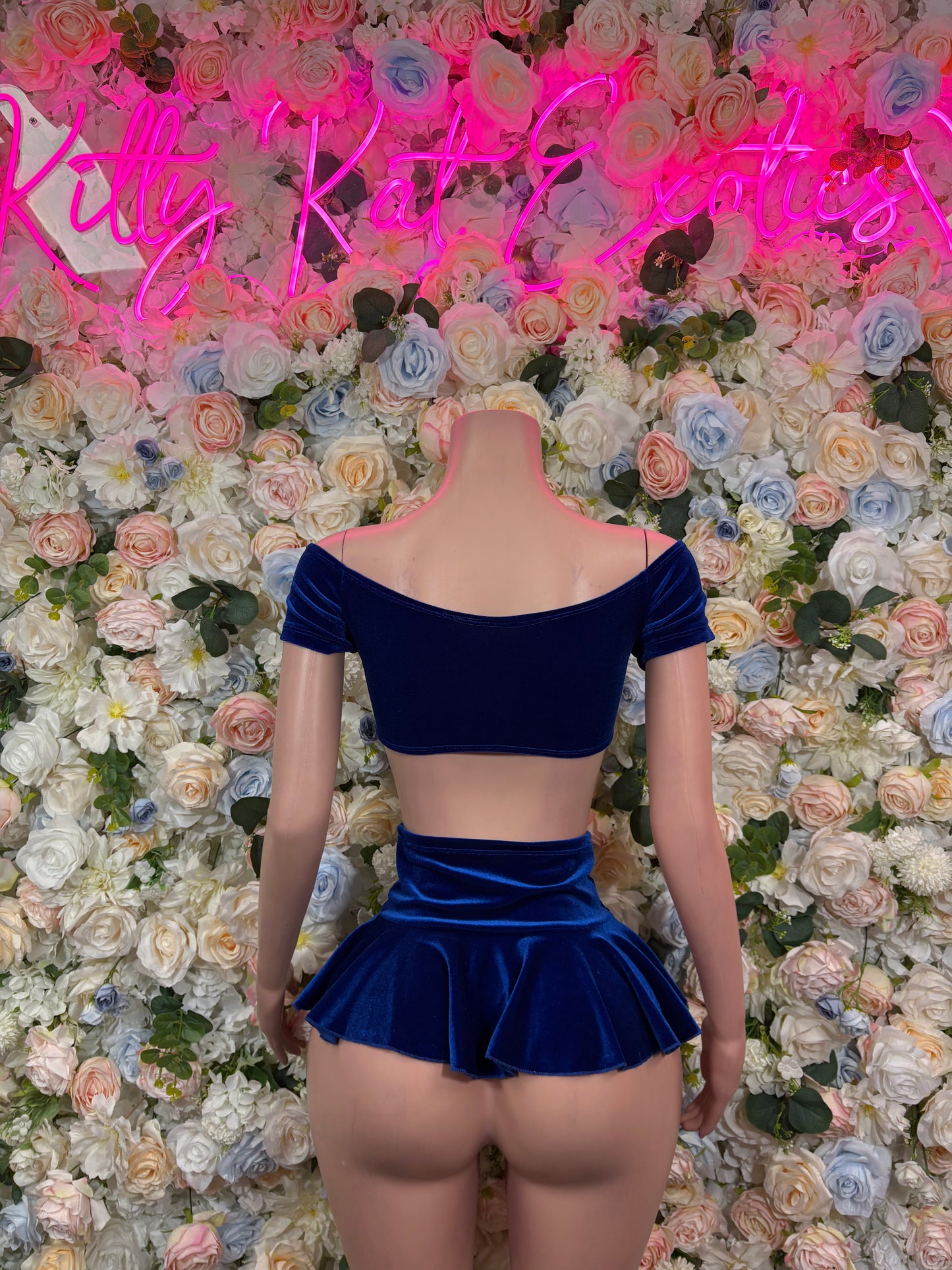 Blue velvet cropped top with low back and matching flared mini skirt
