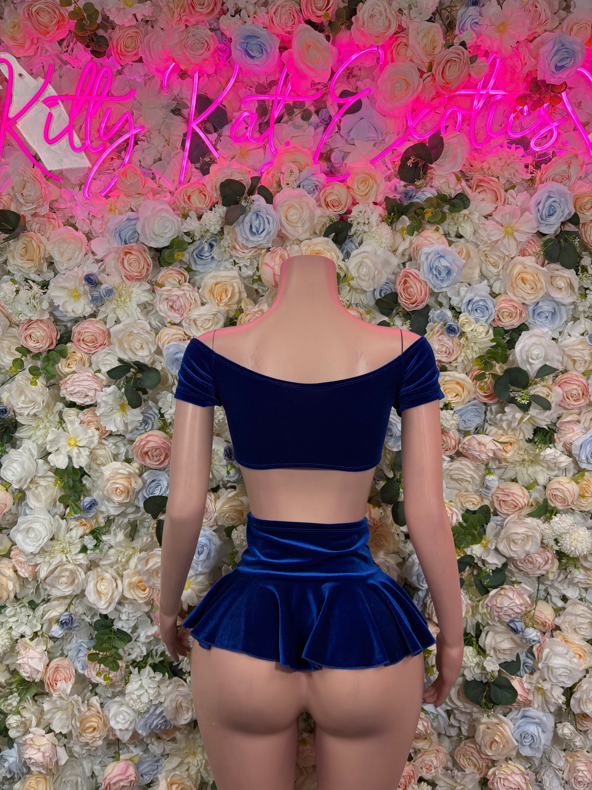Blue velvet cropped top with low back and matching flared mini skirt
