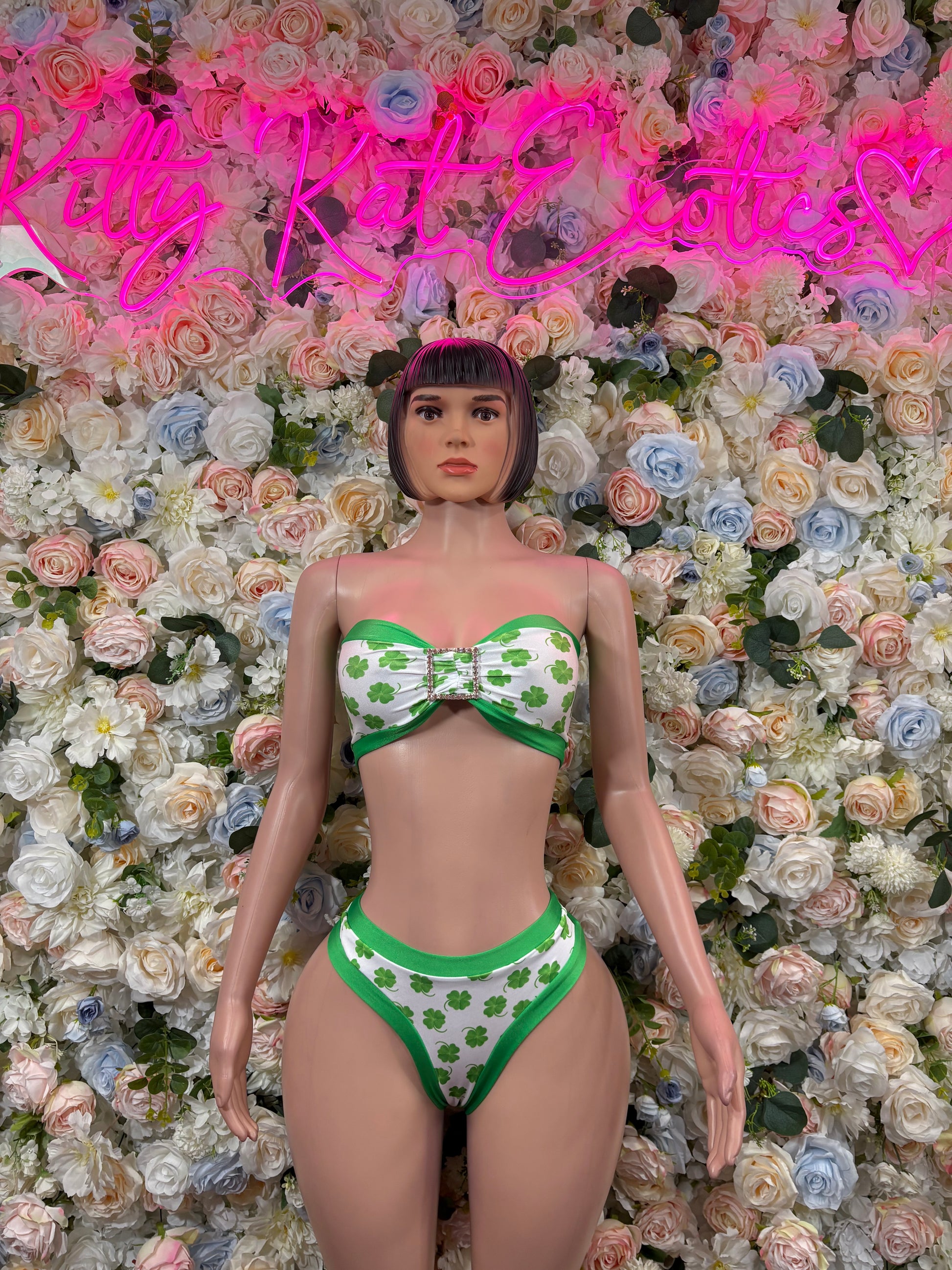 Green shamrock two-piece costume: bow bandeau top and matching briefs