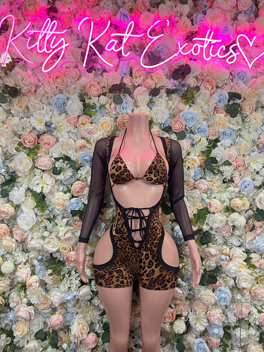 Leopard print romper bodysuit with black mesh sleeves and crisscross lace-up front