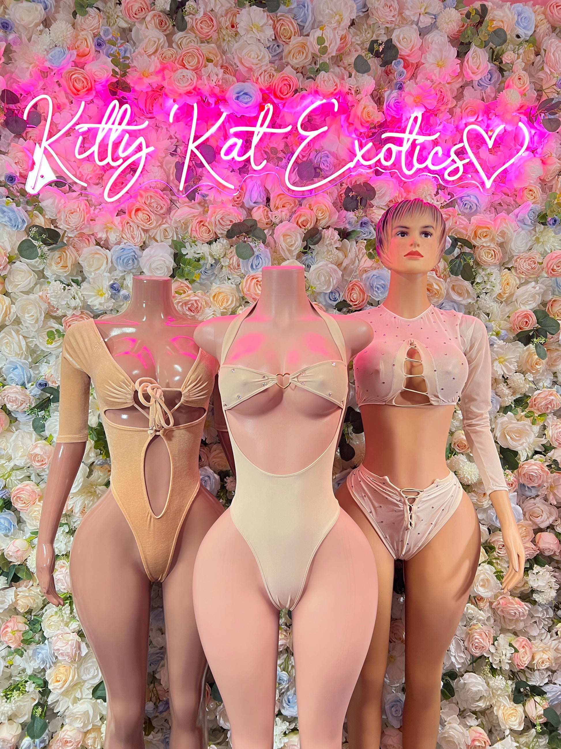 Nude one-piece dancewear sets on three models, bow tie detail at chest